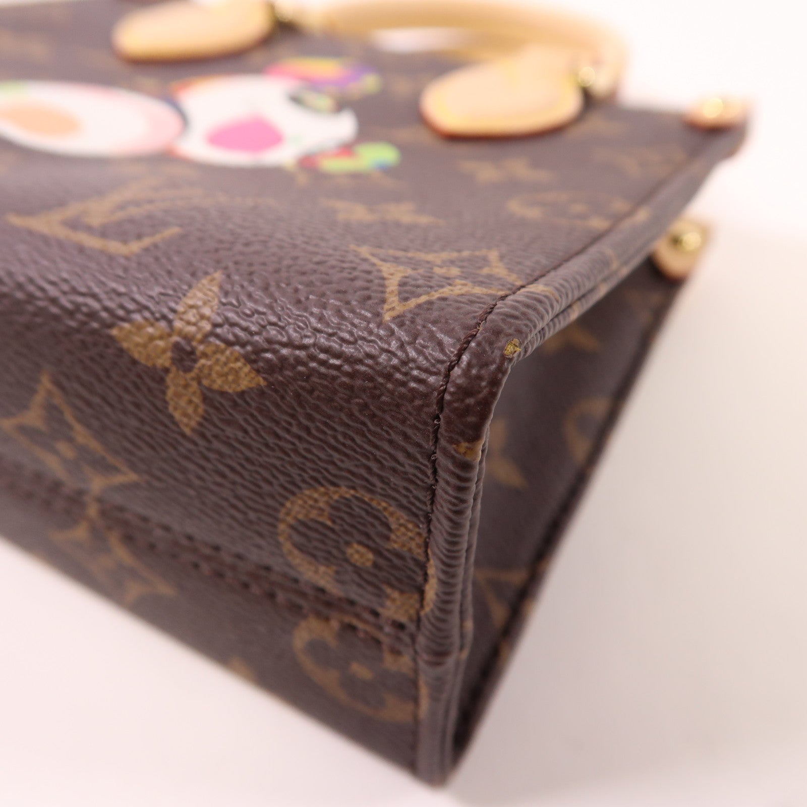 LOUIS VUITTON 塗Monogram LV X TM On The Go BB金扣手挽肩背兩用袋
