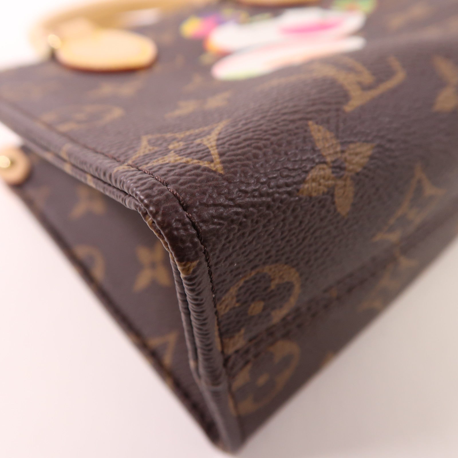 LOUIS VUITTON 塗Monogram LV X TM On The Go BB金扣手挽肩背兩用袋