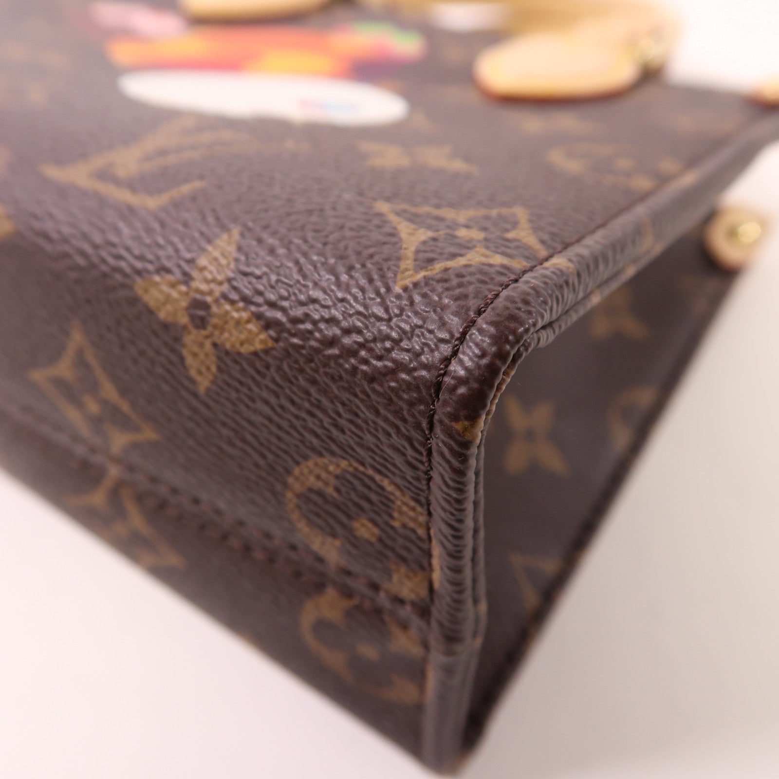 LOUIS VUITTON 塗Monogram LV X TM On The Go BB金扣手挽肩背兩用袋