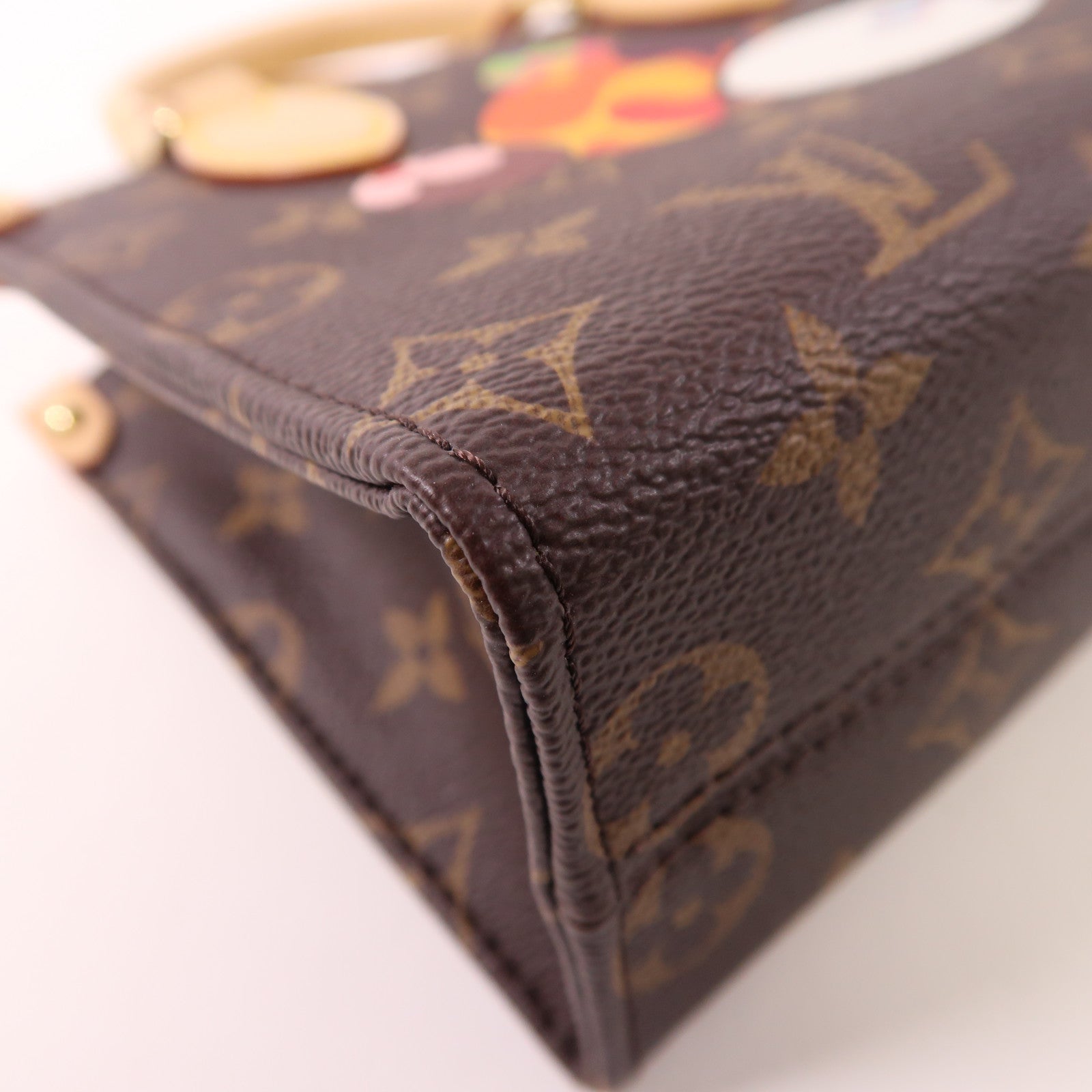 LOUIS VUITTON 塗Monogram LV X TM On The Go BB金扣手挽肩背兩用袋