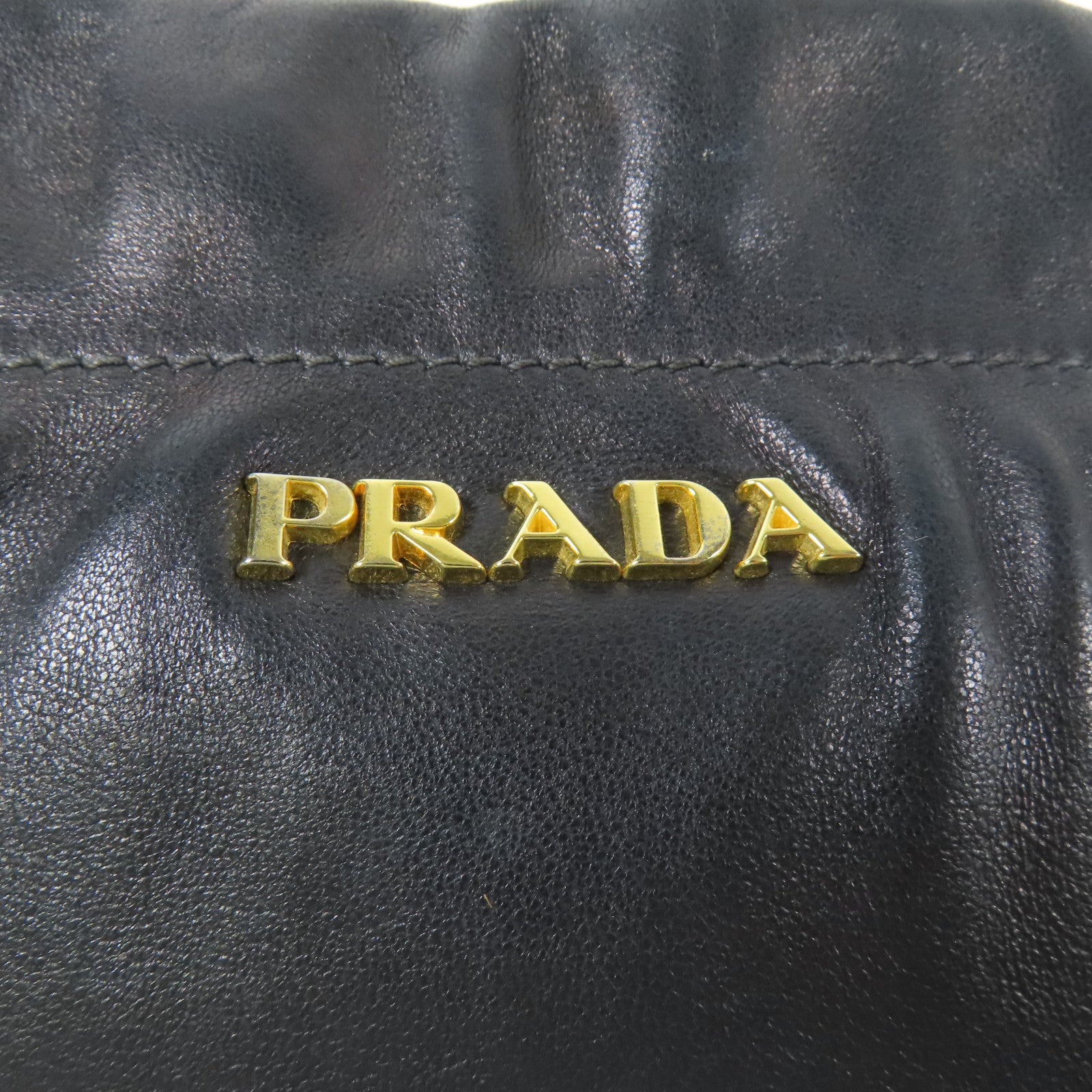 PRADA 皮革Nappa Antique金扣手拿包