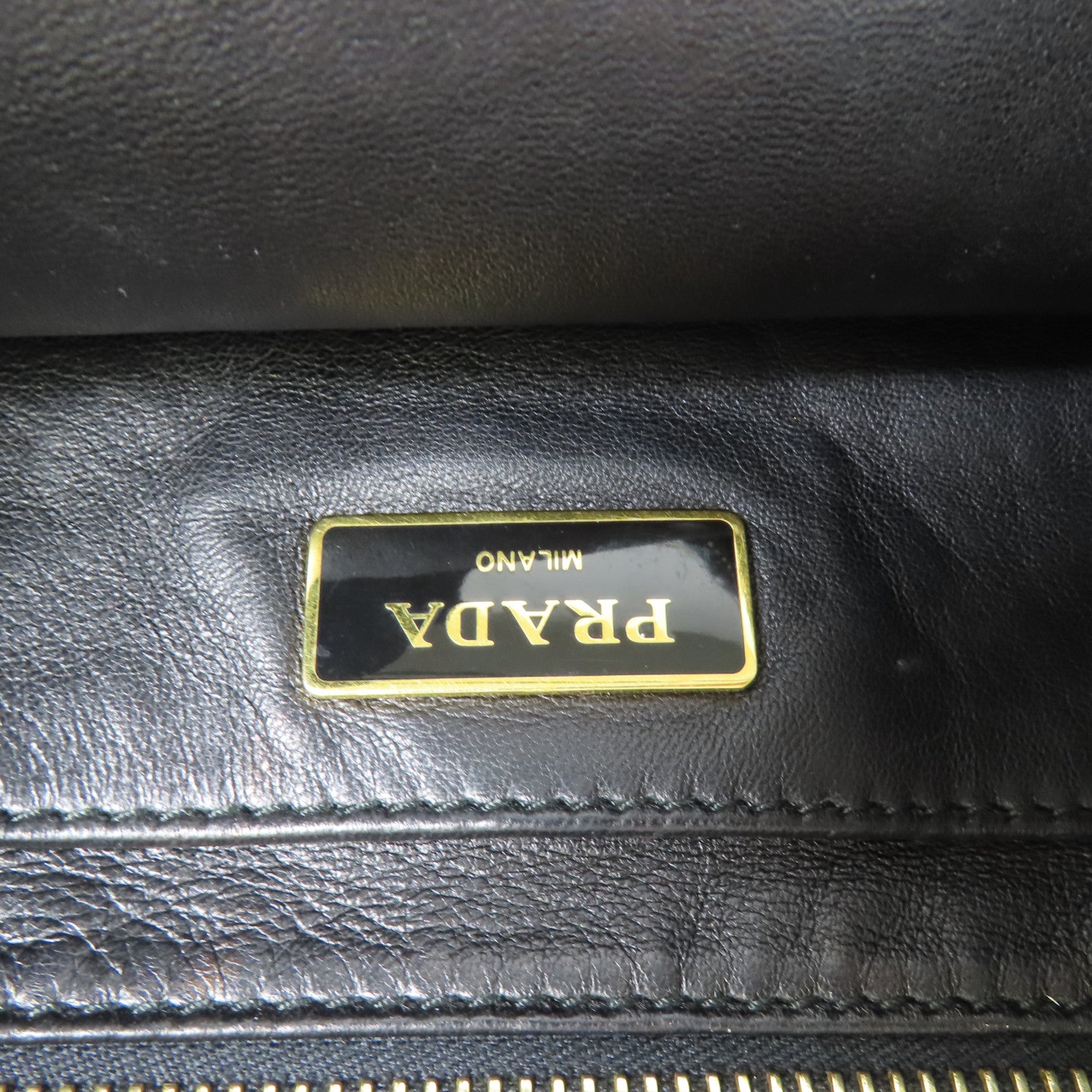 PRADA 皮革Nappa Antique金扣手拿包