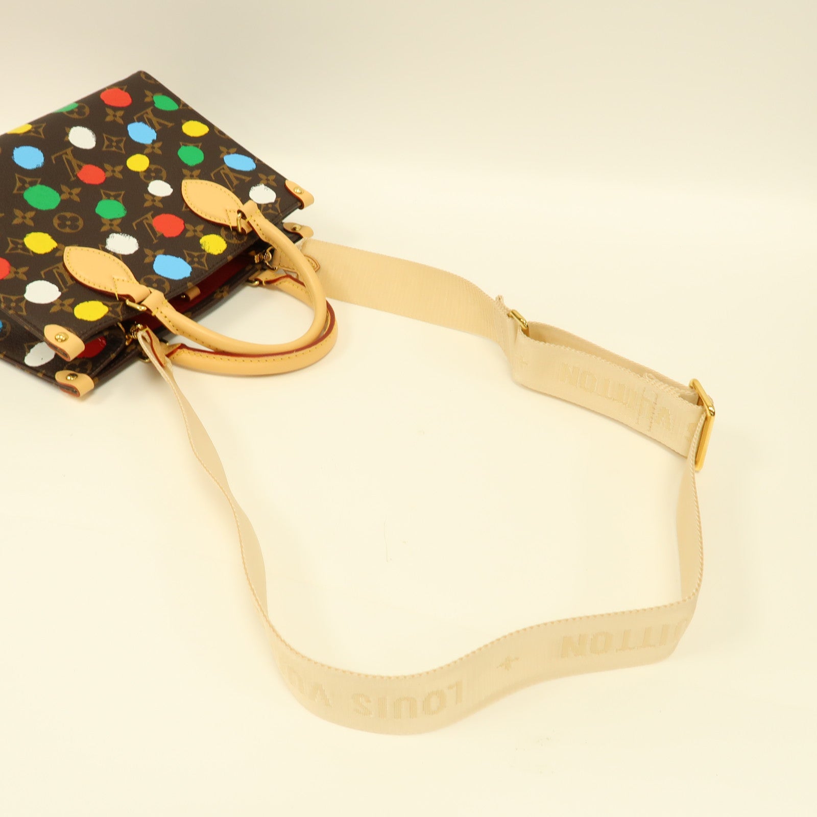 LOUIS VUITTON Monogram LVxYK On The Go金扣手挽肩背兩用袋啡色/彩色