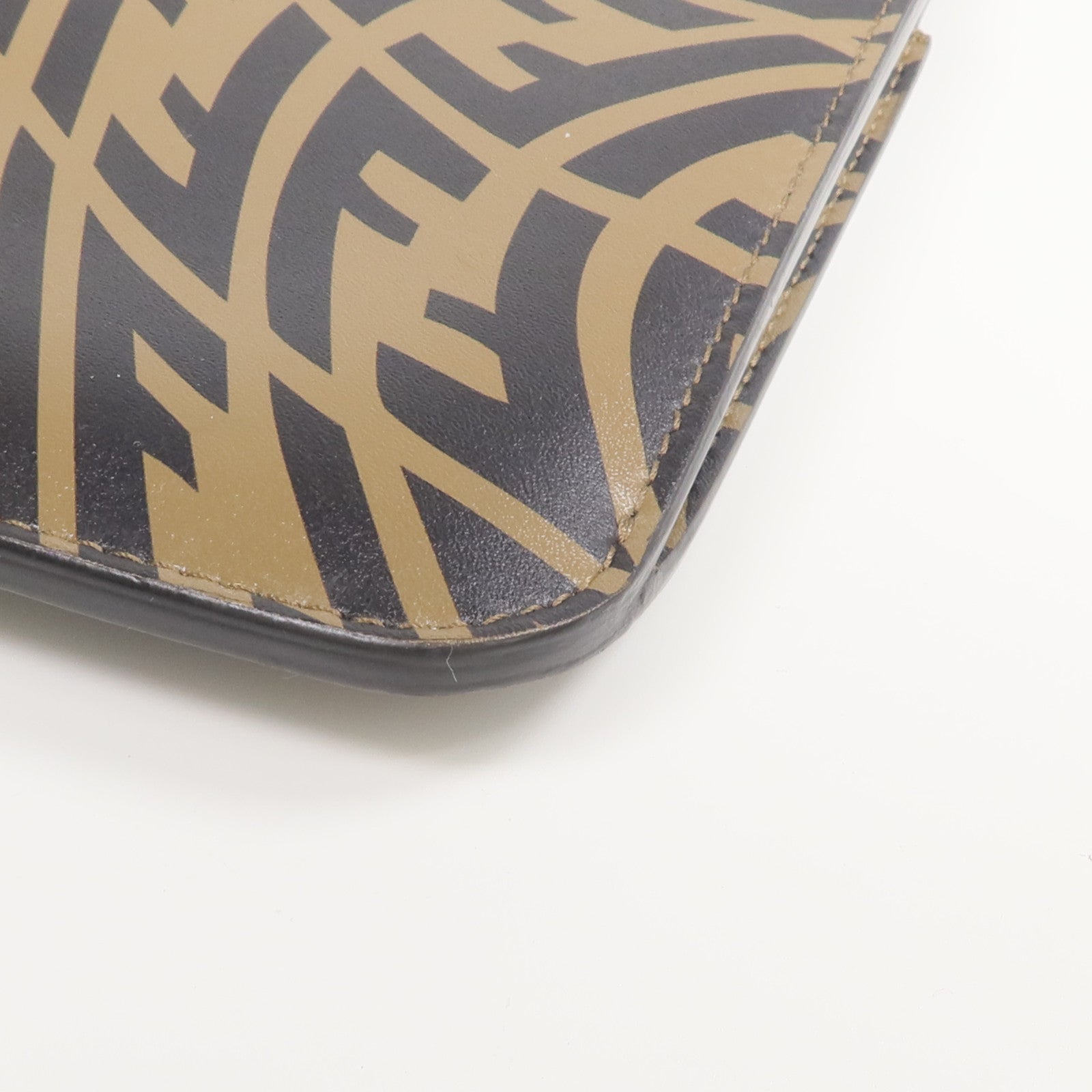 FENDI 牛皮皮革/塗層帆布Fendi Sarah Coleman Vertigo Peek-a-Phone手機袋