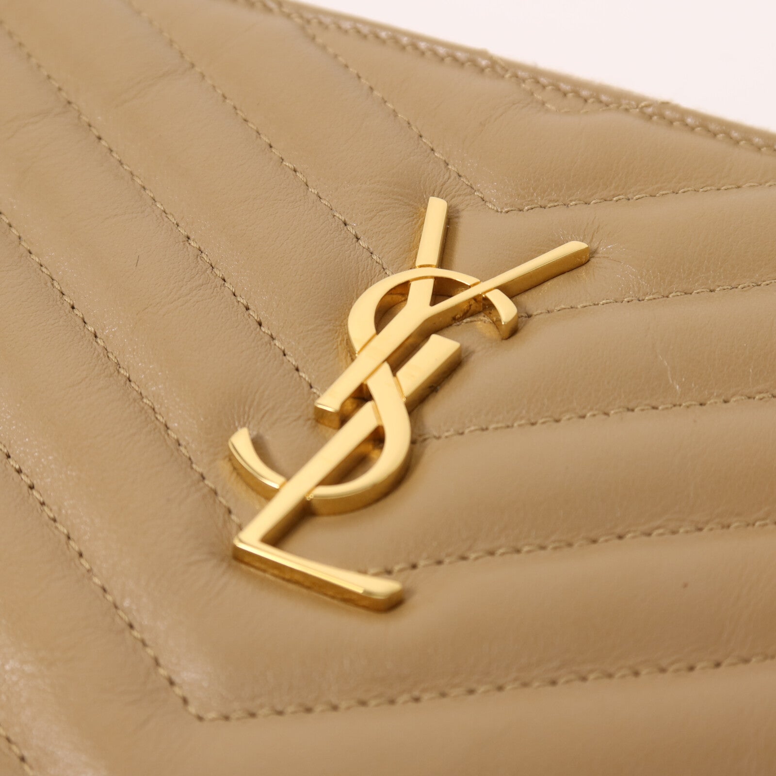 YVES SAINT LAURENT 牛皮皮革Pouch金扣手拿包