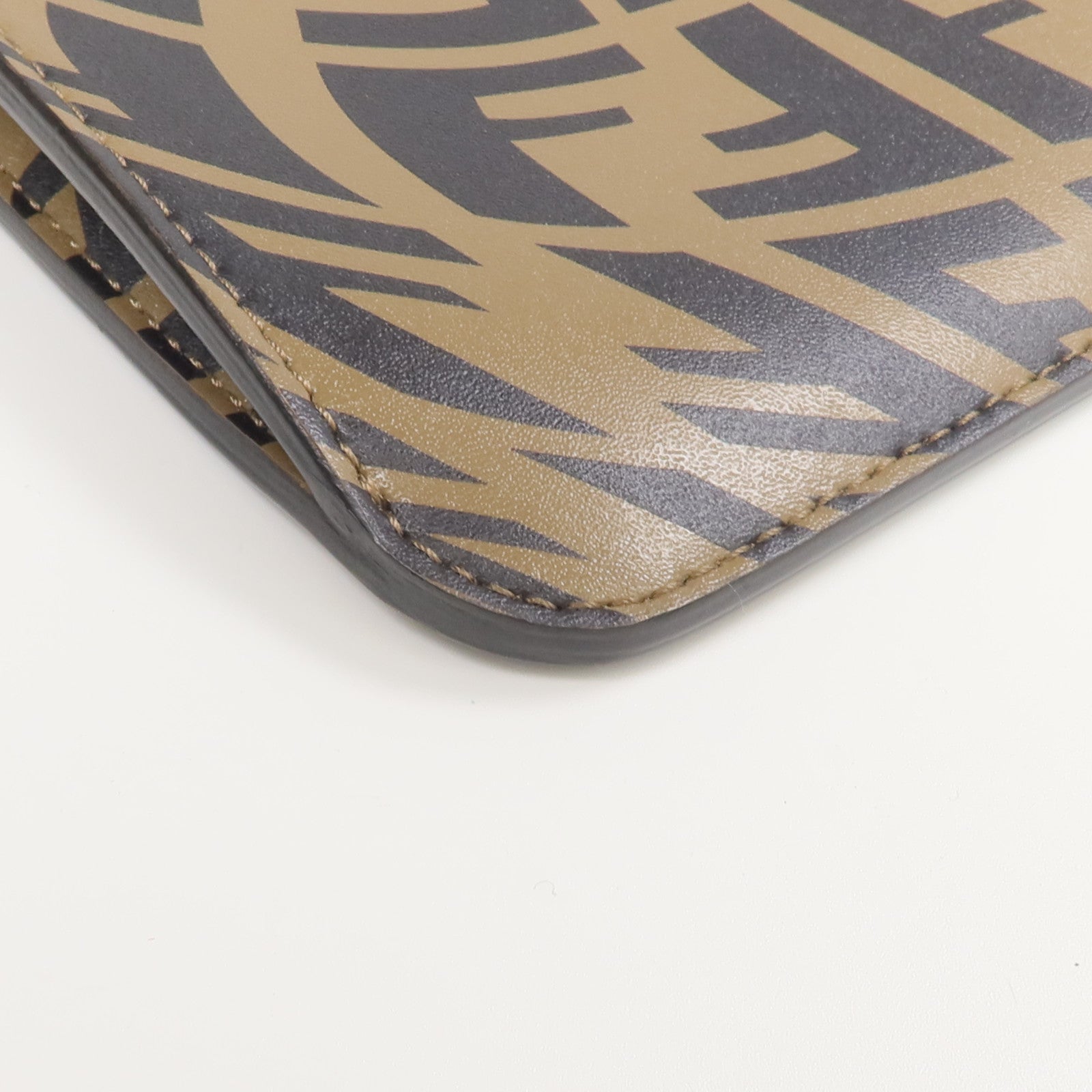 FENDI 牛皮皮革/塗層帆布Fendi Sarah Coleman Vertigo Peek-a-Phone手機袋