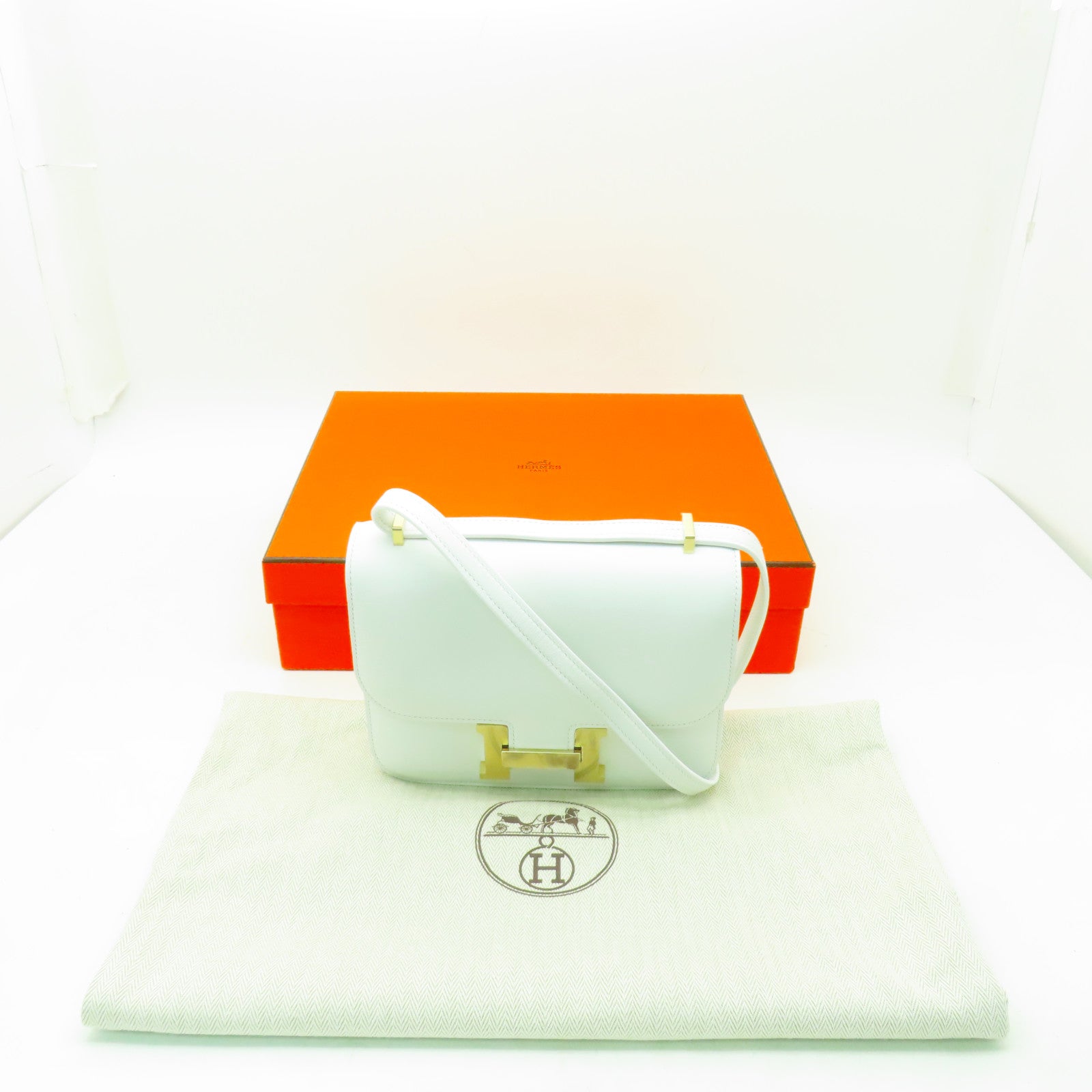 HERMES 【清倉大減價】Swift皮革Constance Mini III金扣肩背袋白色