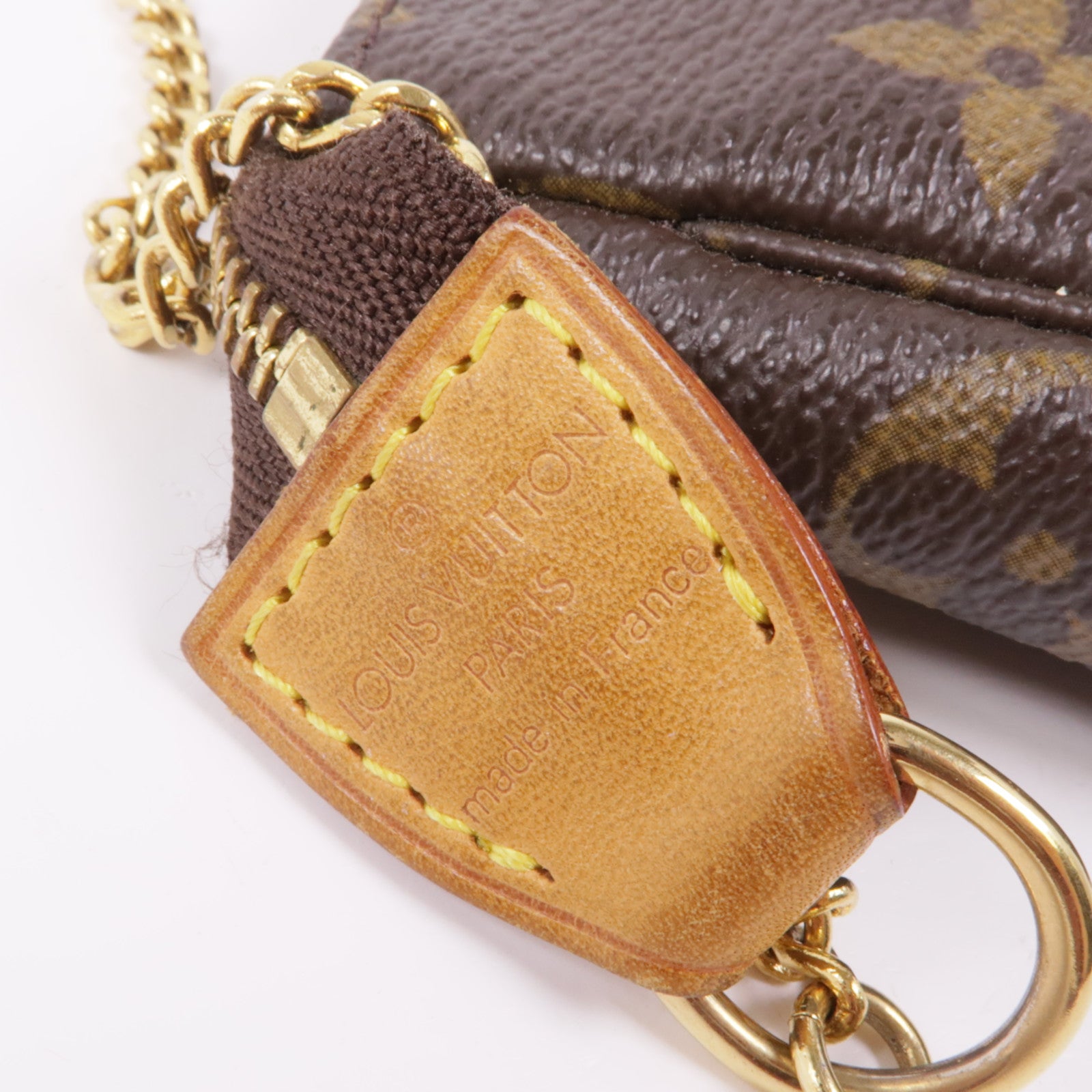 LOUIS VUITTON Monogram Mini Pochette Accessoires金扣手挽袋棕色