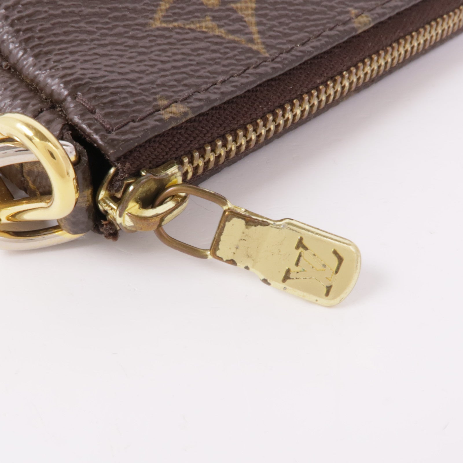 LOUIS VUITTON Monogram Mini Pochette Accessoires金扣手挽袋棕色