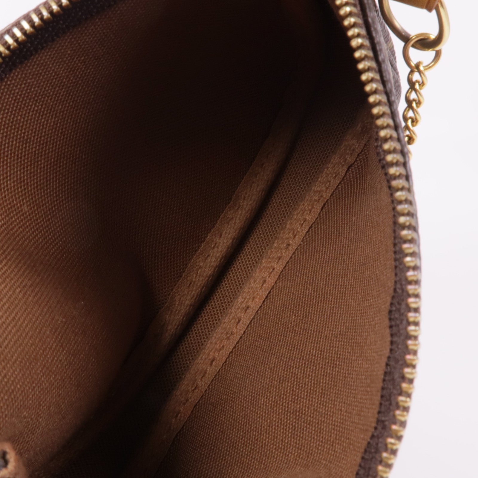 LOUIS VUITTON Monogram Mini Pochette Accessoires金扣手挽袋棕色