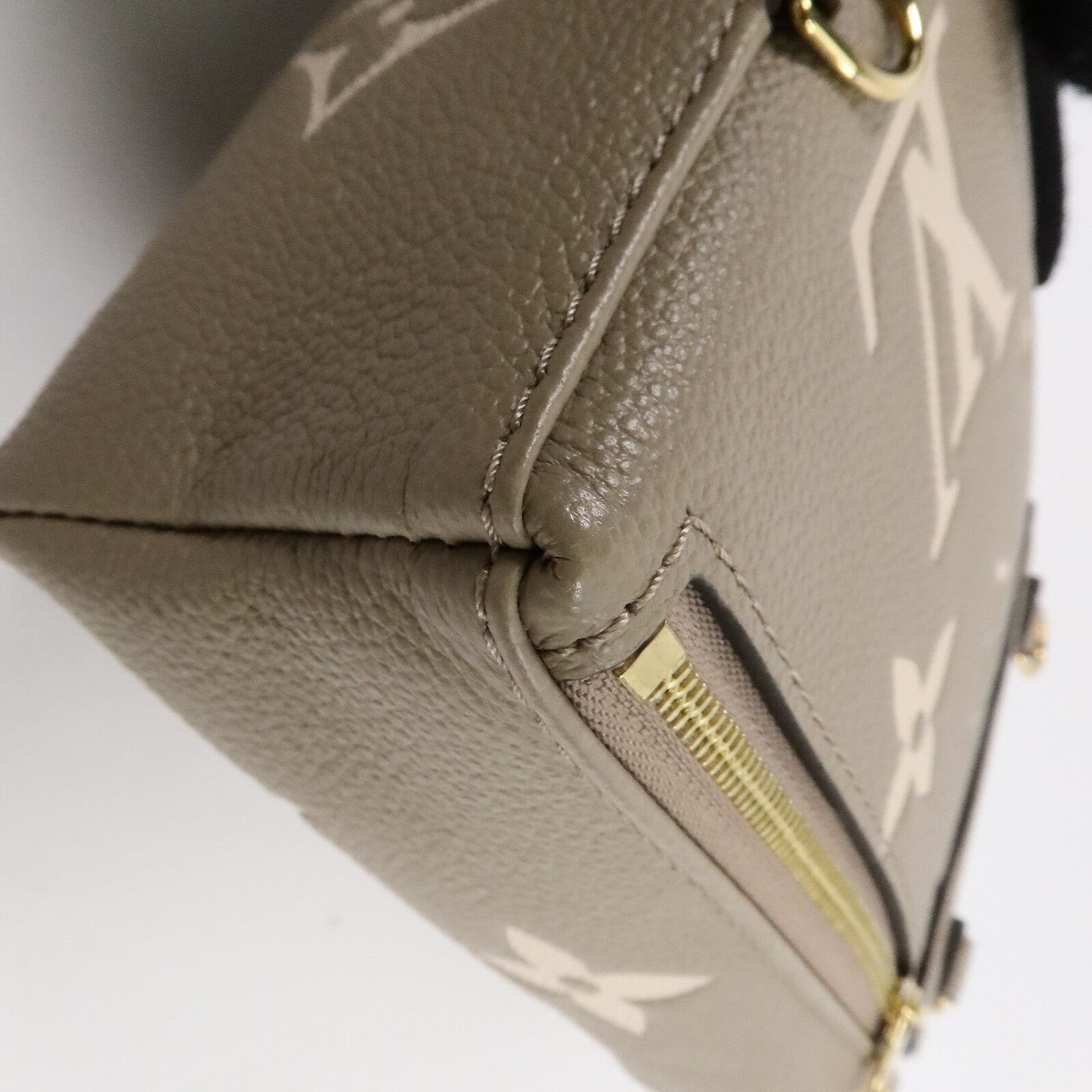 LOUIS VUITTON Monogram Empreinte Tiny Backpack背包