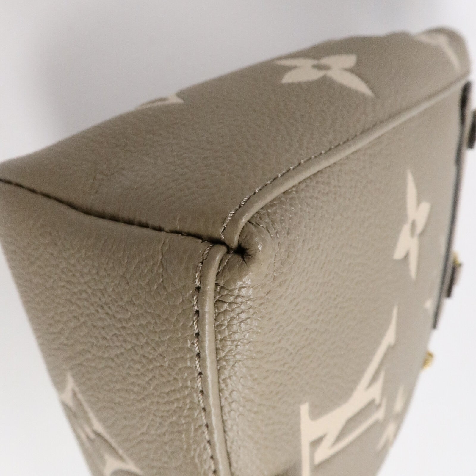 LOUIS VUITTON Monogram Empreinte Tiny Backpack背包