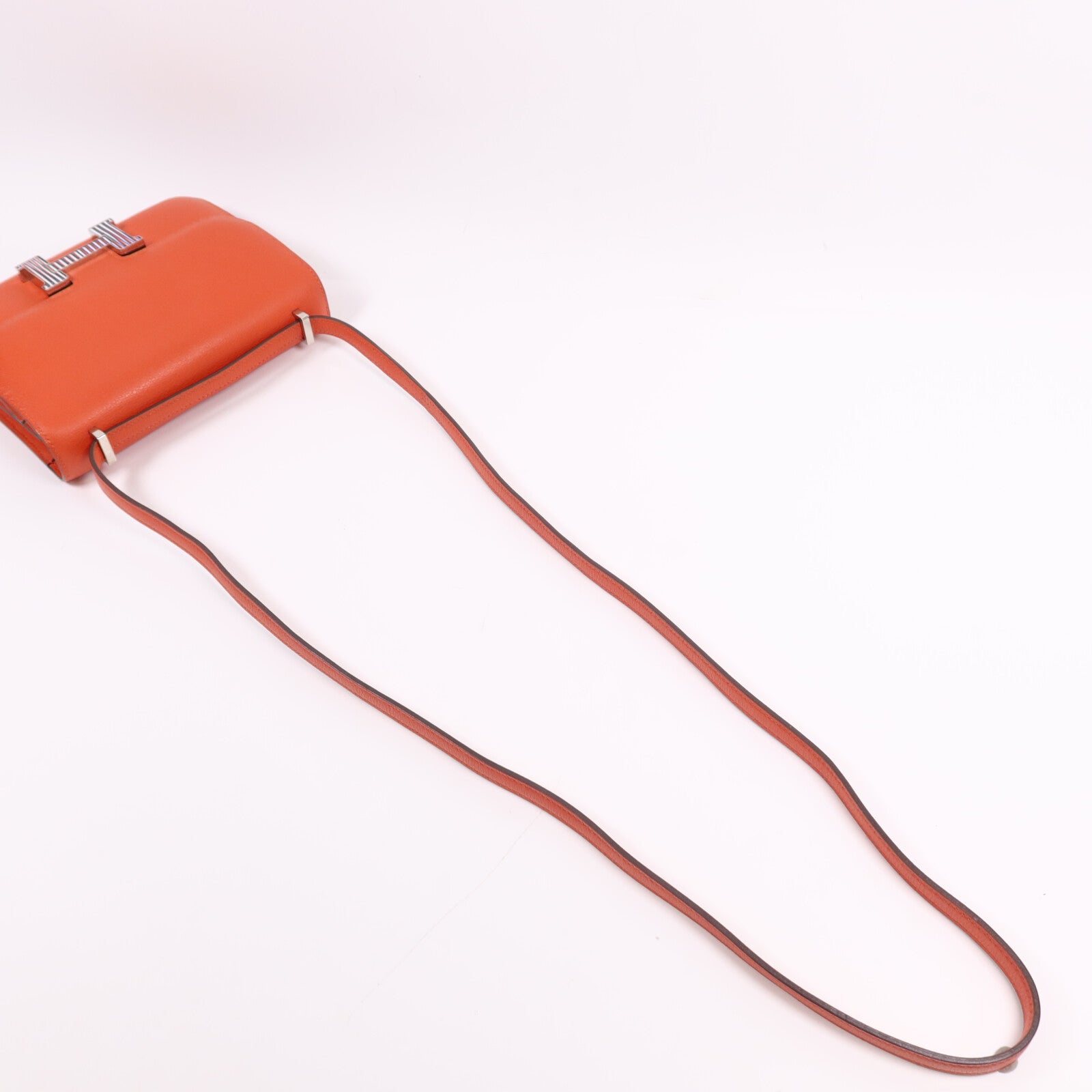 HERMES Evercolor皮革Constance Mini銀扣肩背袋Capucine