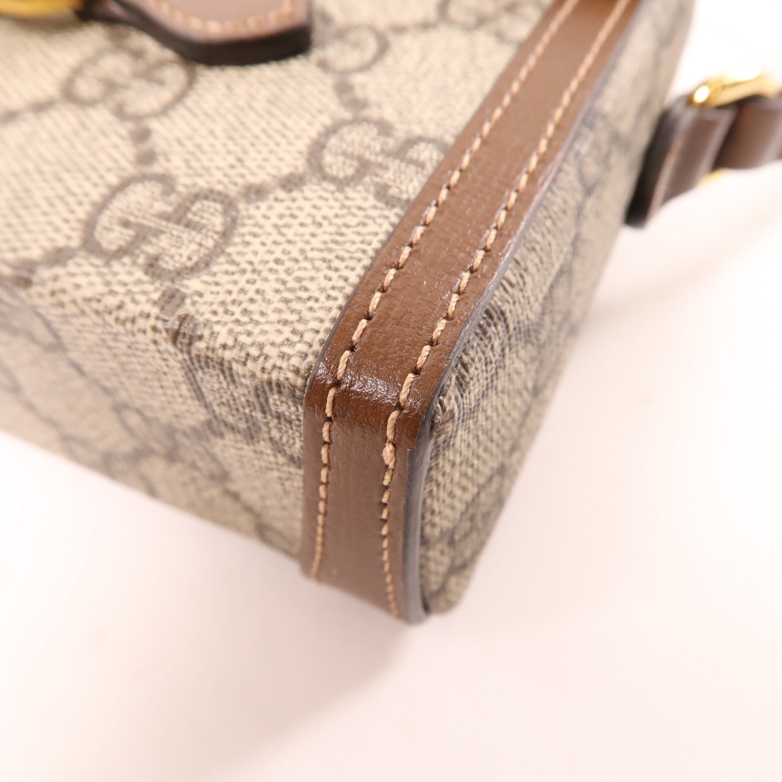 GUCCI 塗層帆布GG Supreme 1955金扣肩背袋棕色