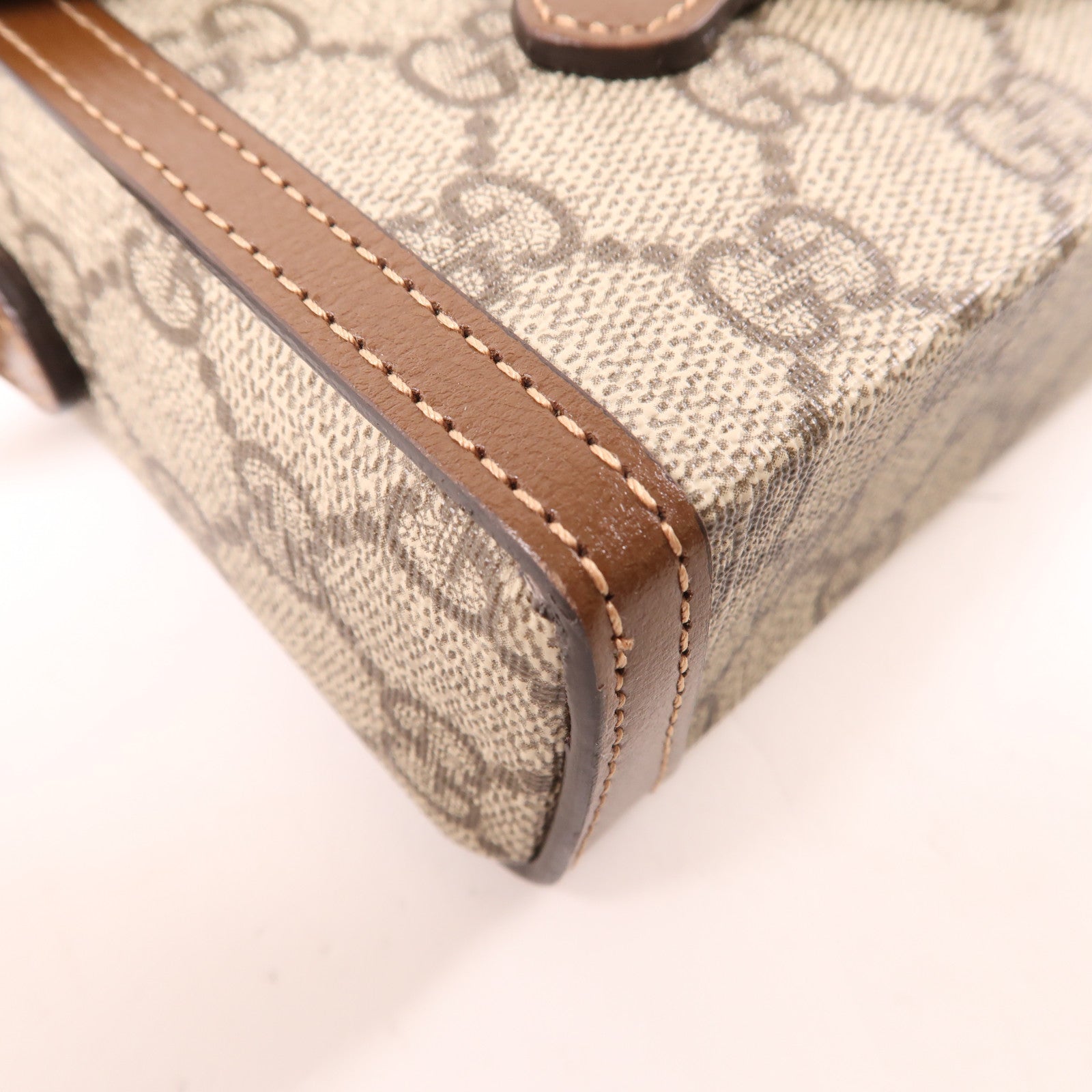 GUCCI 塗層帆布GG Supreme 1955金扣肩背袋棕色
