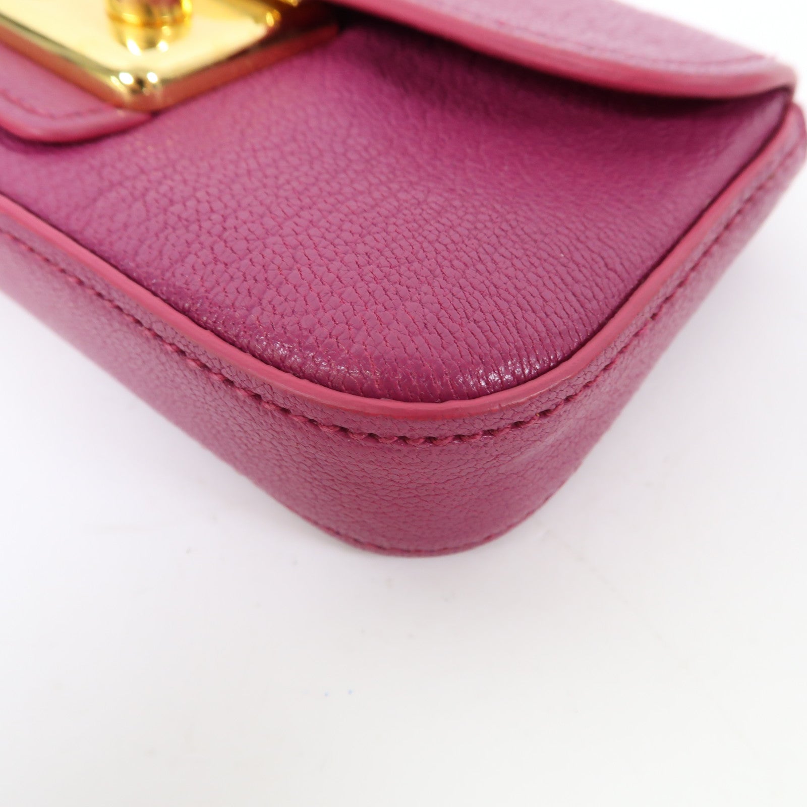 Miu Miu 牛皮皮革Clutch金扣手拿包紫紅色