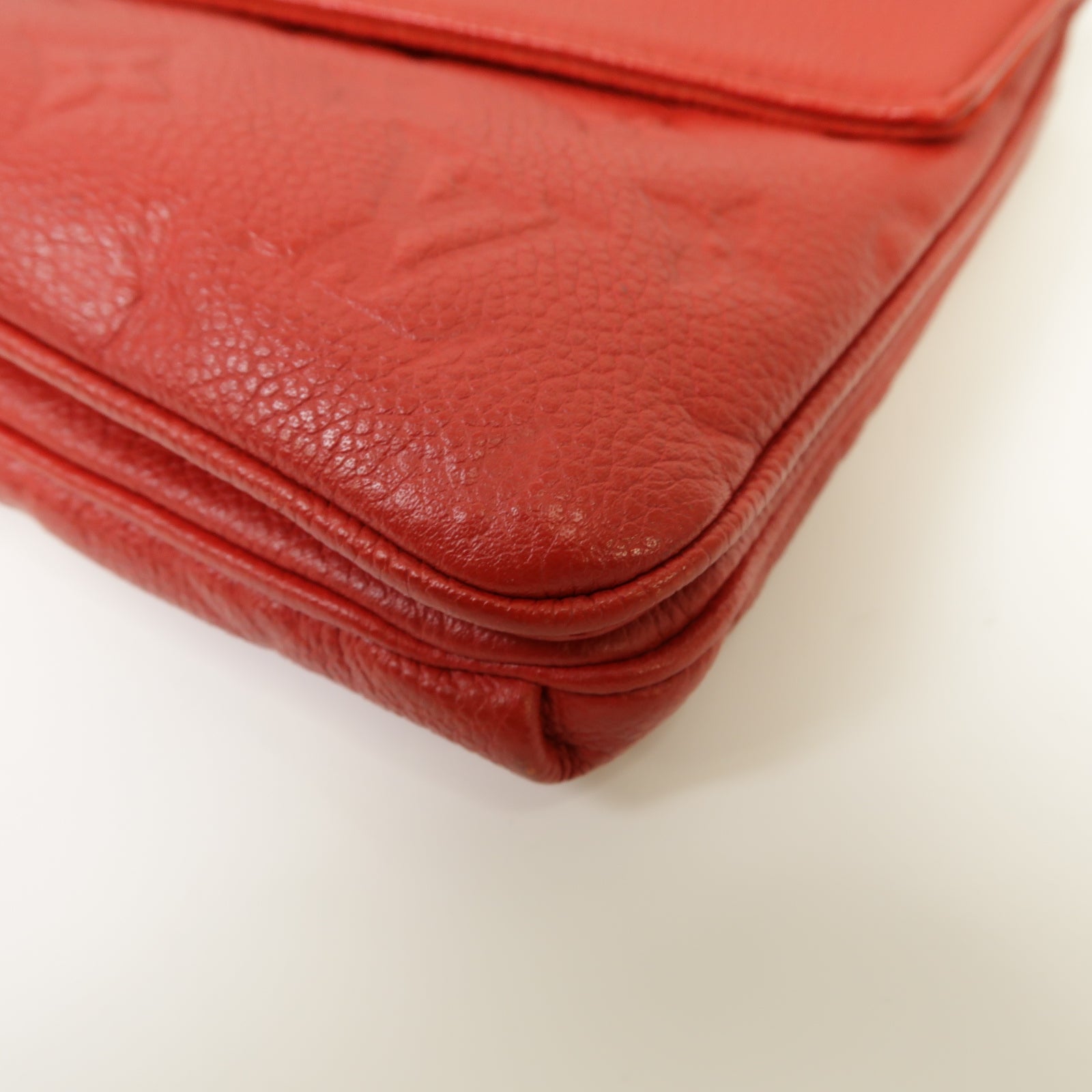 LOUIS VUITTON Monogram Empreinte Twice金扣肩背袋紅色