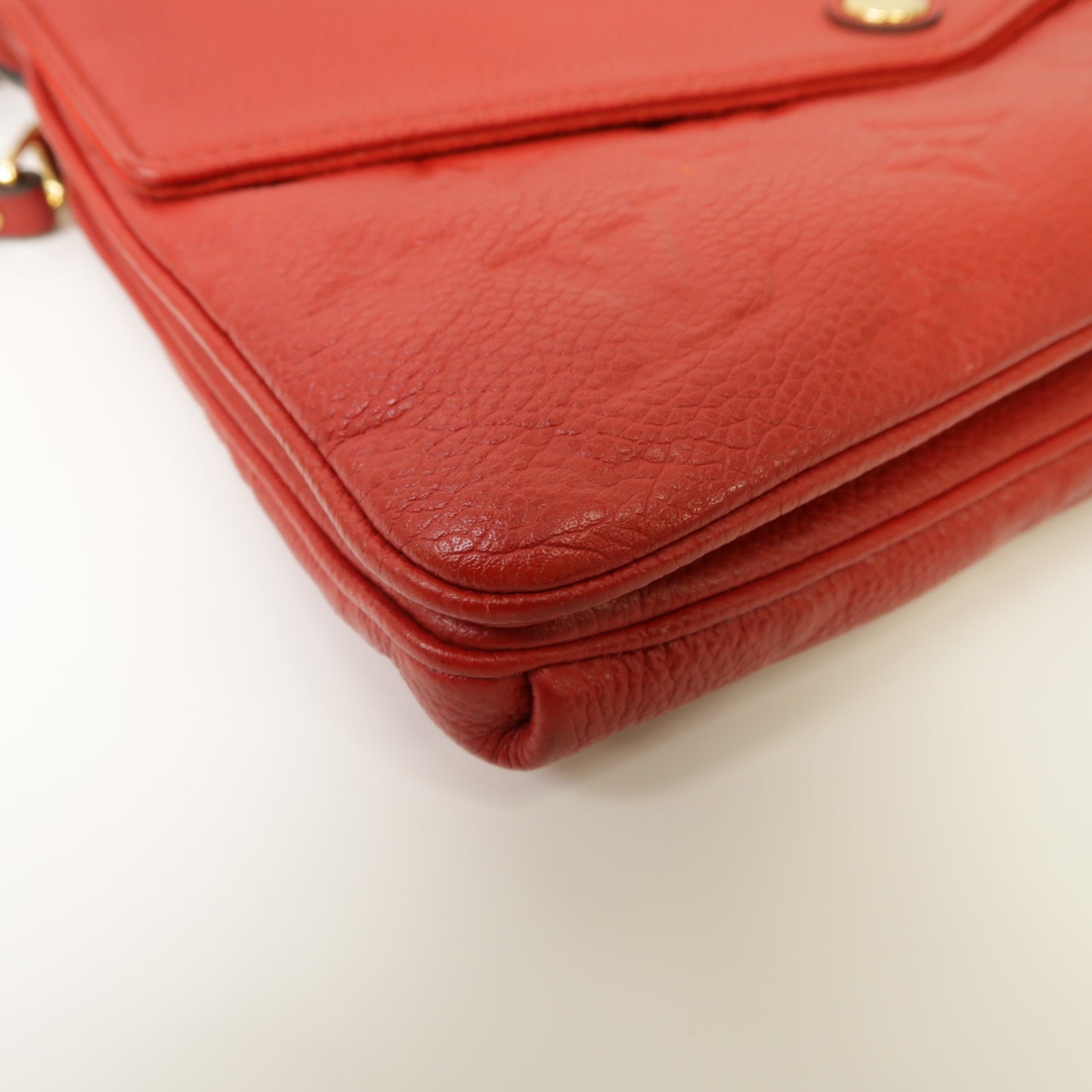 LOUIS VUITTON Monogram Empreinte Twice金扣肩背袋紅色