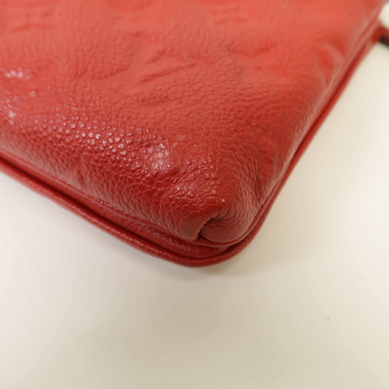 LOUIS VUITTON Monogram Empreinte Twice金扣肩背袋紅色