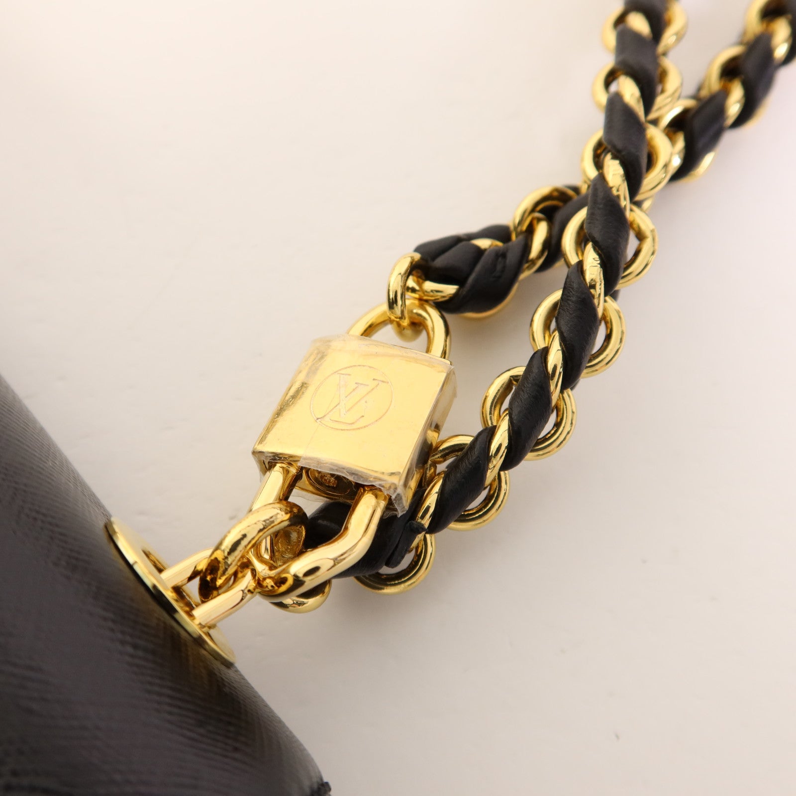 LOUIS VUITTON 牛皮皮革Pochette Thelma金扣肩背袋