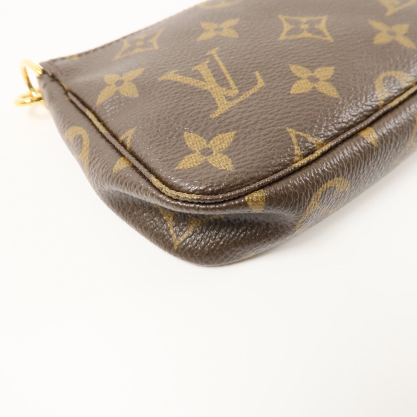 LOUIS VUITTON Monogram Mini Pochette Accessoires金扣手挽袋棕色