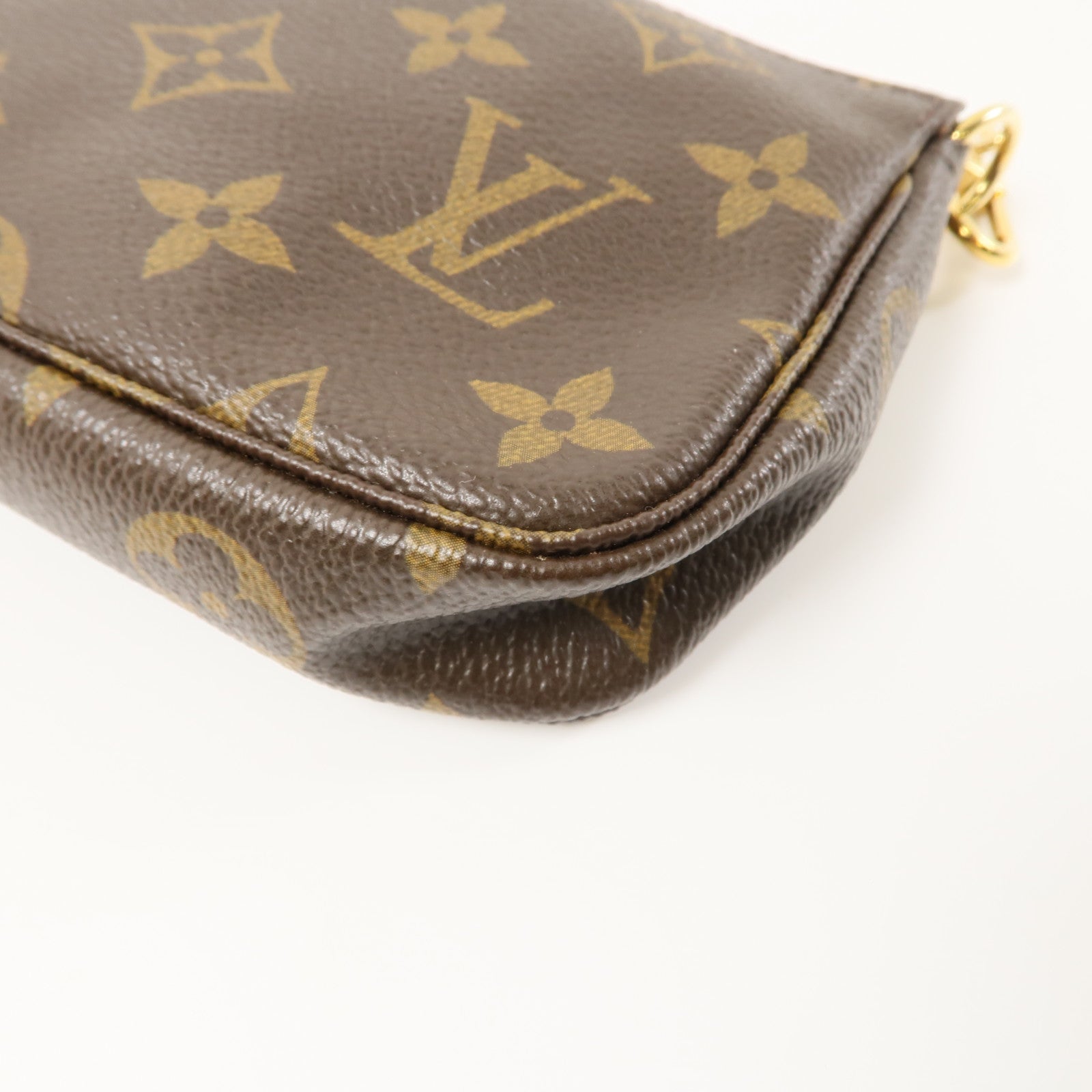 LOUIS VUITTON Monogram Mini Pochette Accessoires金扣手挽袋棕色