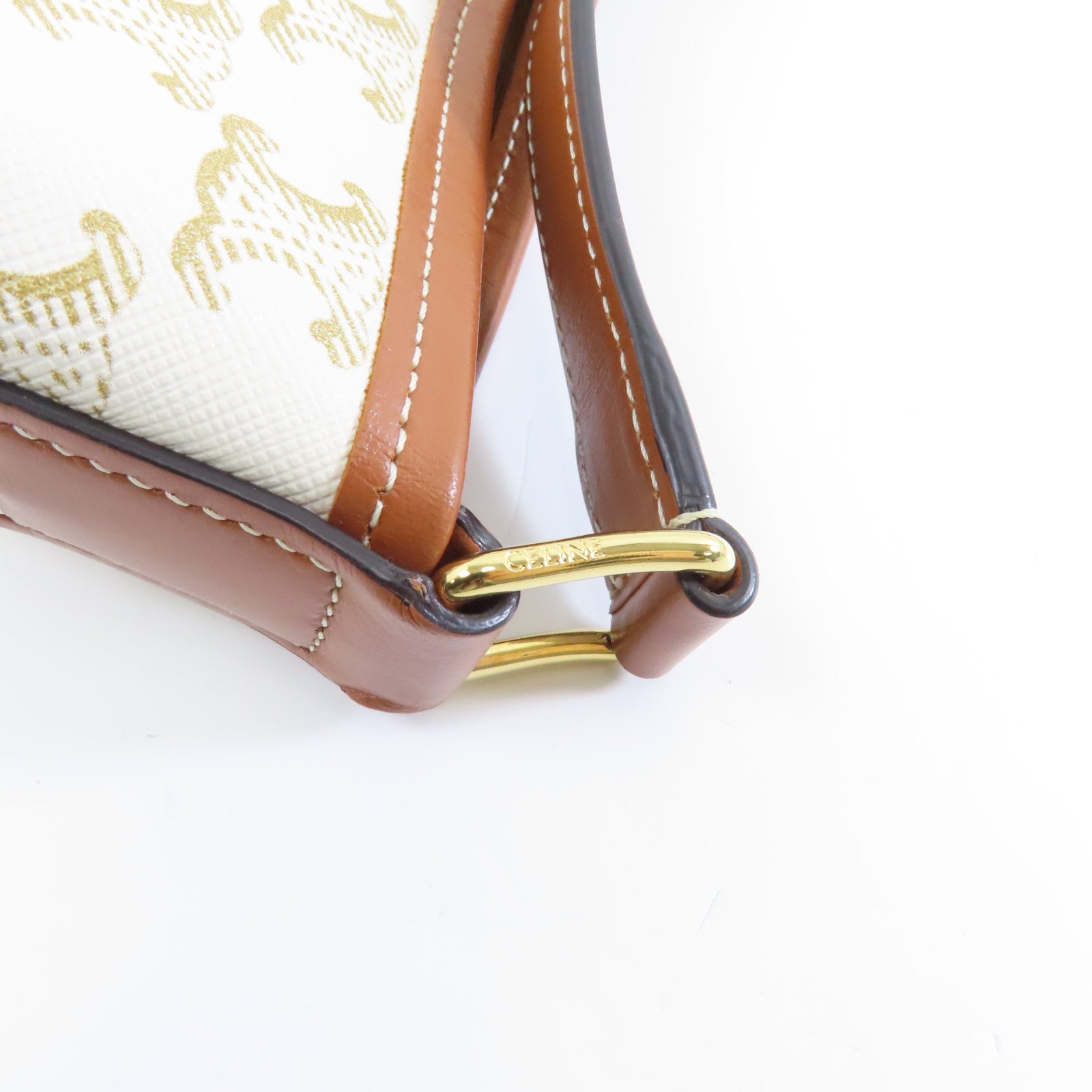 CELINE 塗層帆布Triomphe Bucket金扣肩背袋白色