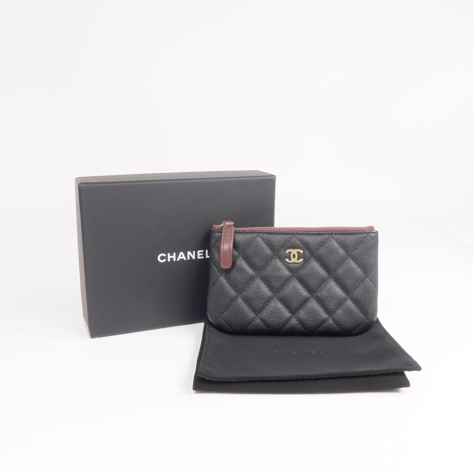 CHANEL 牛皮皮革Mini Pouch金扣手拿包