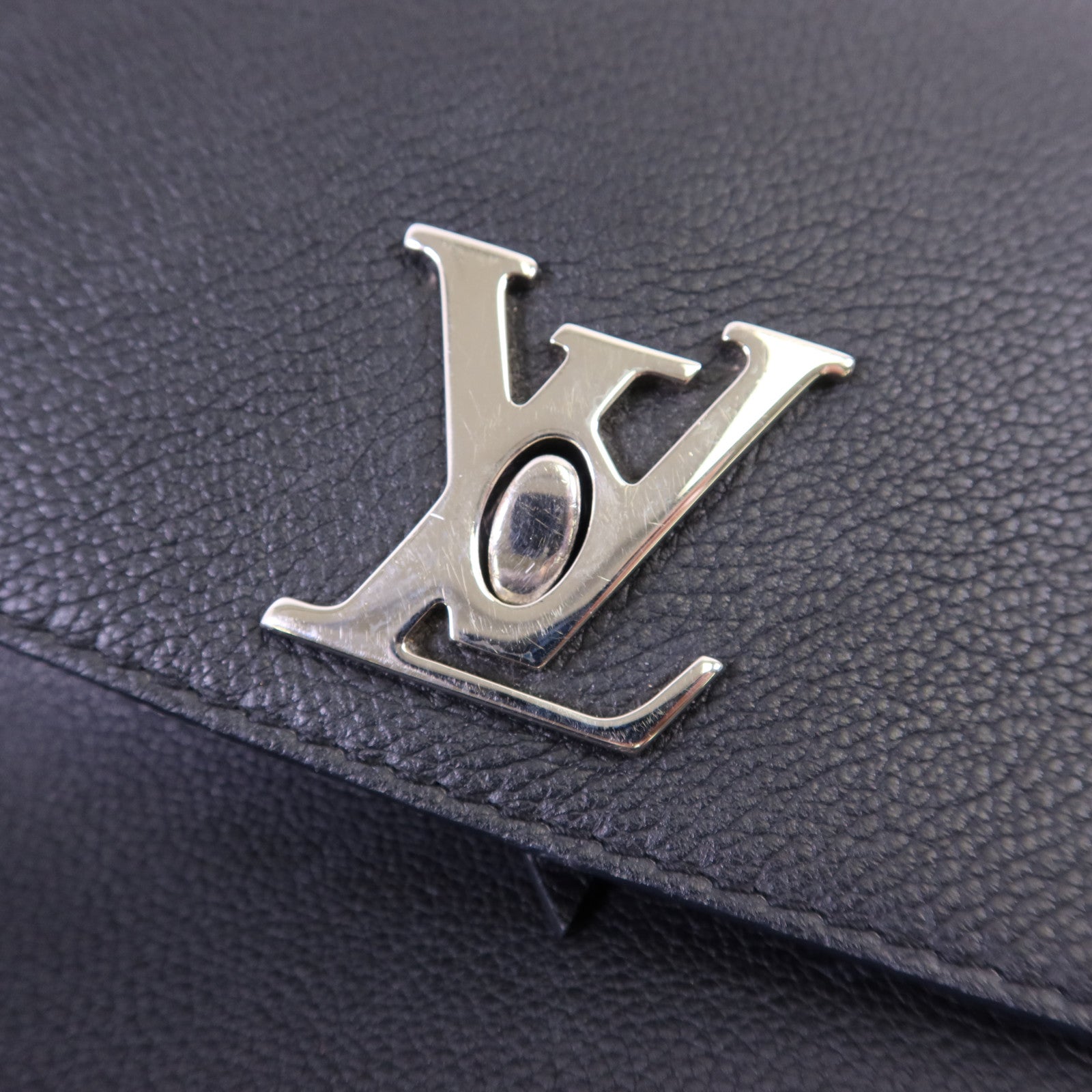 LOUIS VUITTON 【激減優惠】牛皮皮革Lock Me Backpack銀扣背包