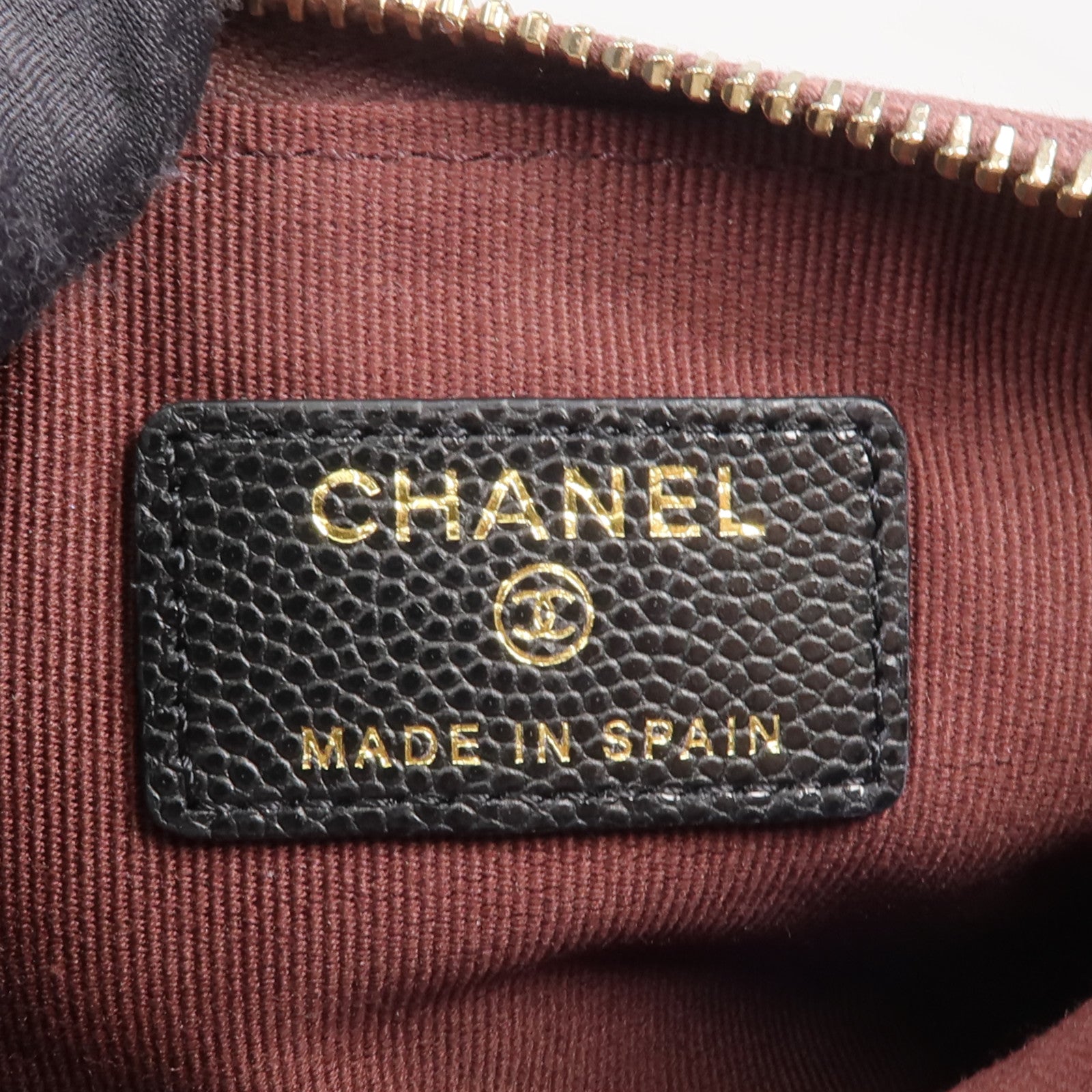 CHANEL 牛皮皮革Mini Pouch金扣手拿包