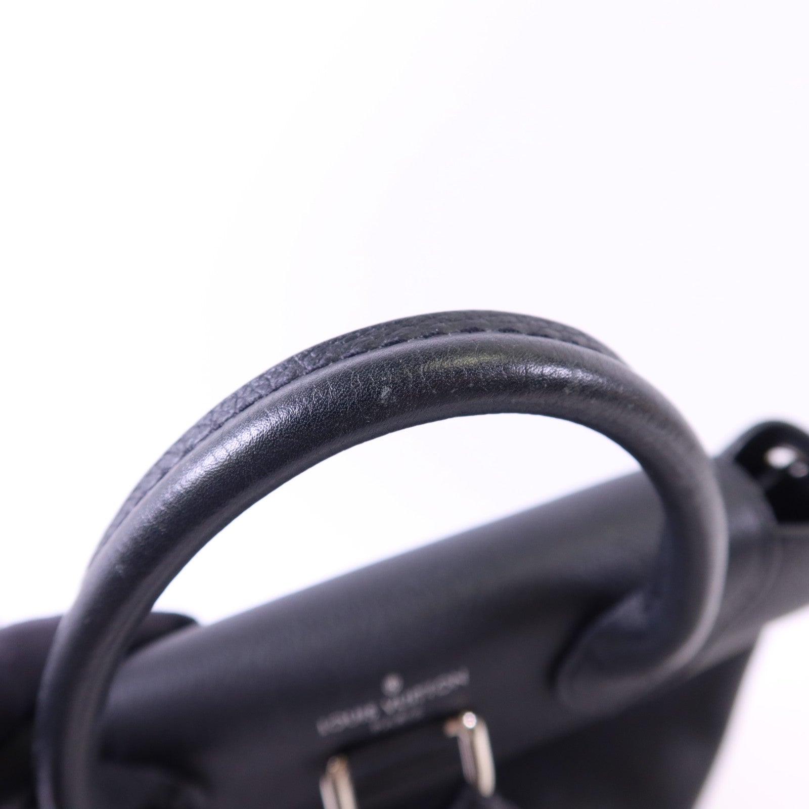 LOUIS VUITTON 【激減優惠】牛皮皮革Lock Me Backpack銀扣背包