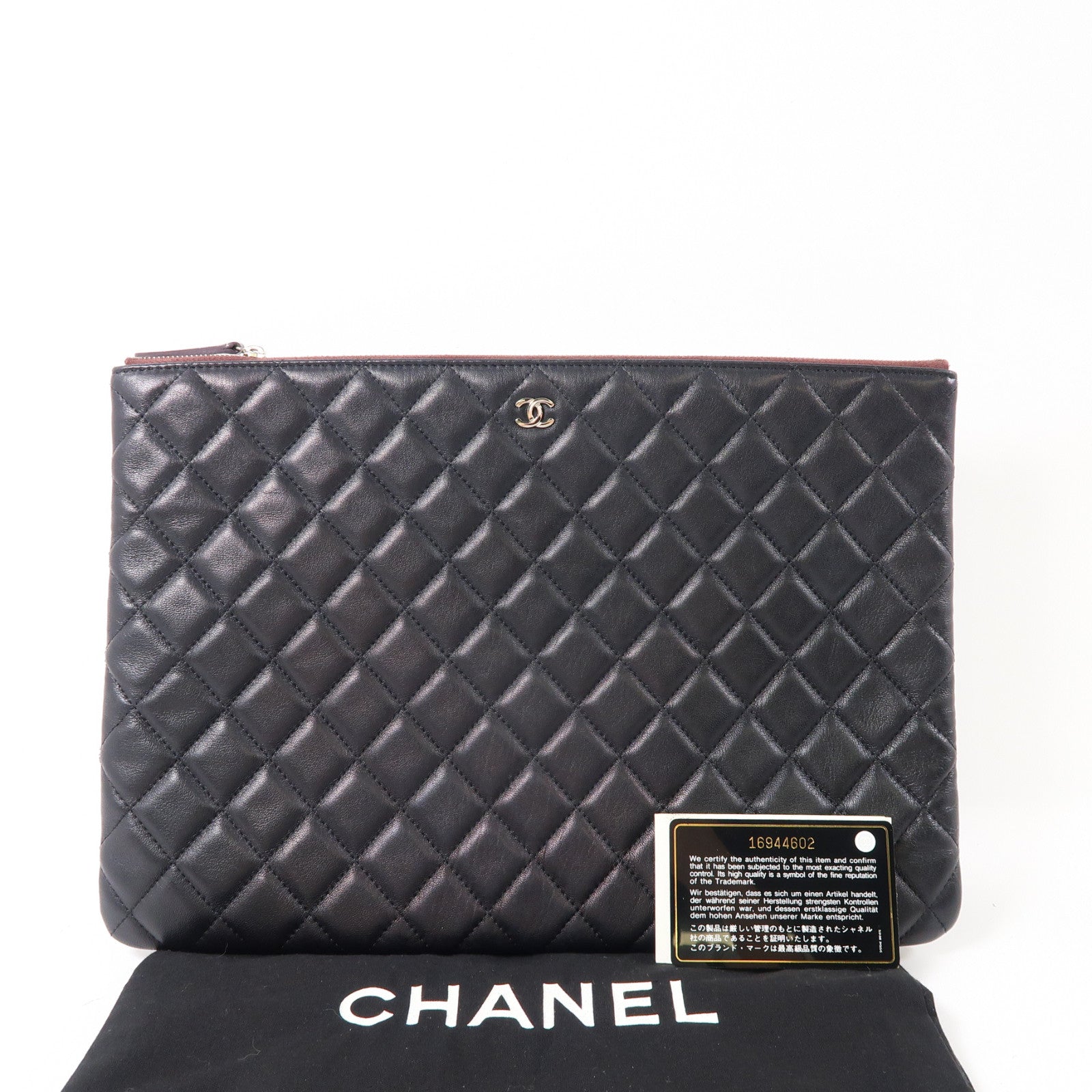 CHANEL 菱格羊皮皮革Pouch銀扣手拿包黑色