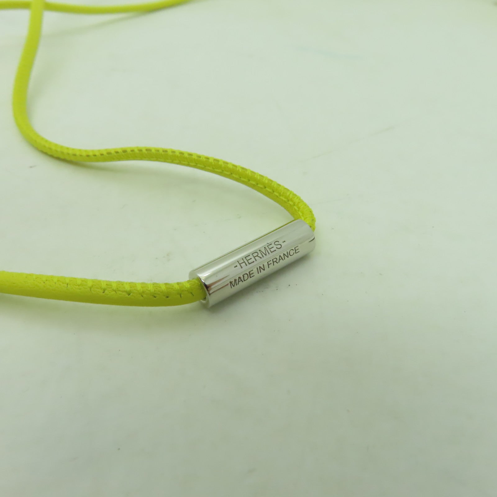 HERMES 【激減優惠】Swift皮革Mon Petit Kelly PM Necklace Pendant銀扣項鍊Lime檸檬黃色/Nata奶油白色