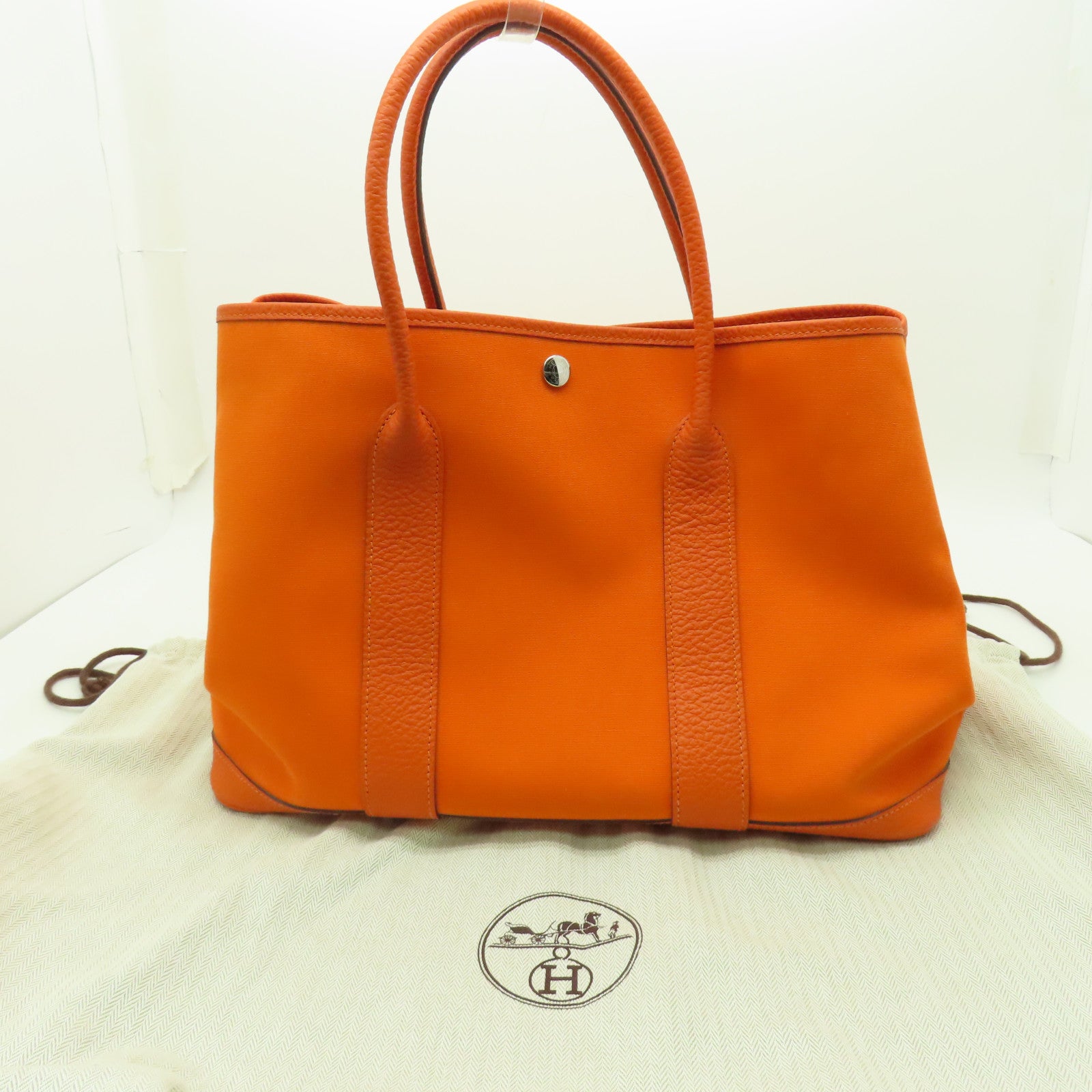HERMES **【清倉大減價】帆布Garden Party PM銀扣手挽袋橙色