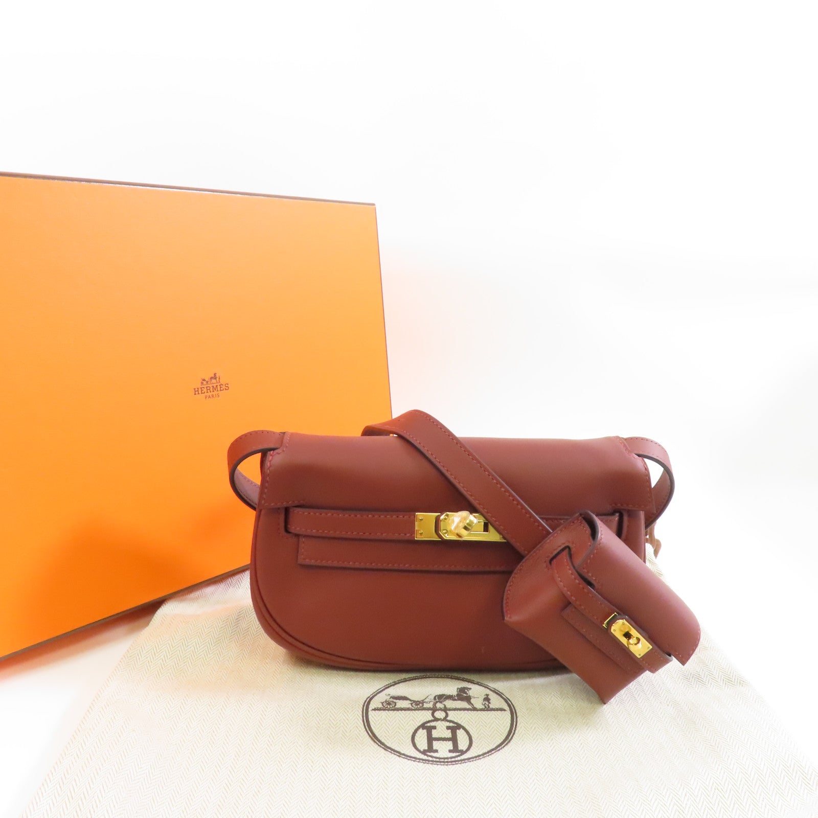 HERMES 【激減優惠】Swift皮革Kelly Moove金扣肩背袋Rouge/棕色