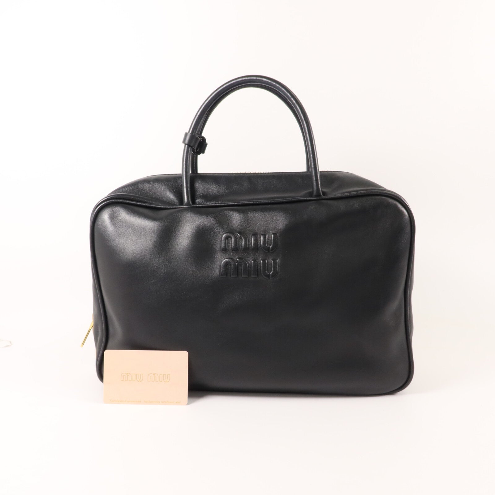 Miu Miu 牛皮皮革Beau Bag手挽袋
