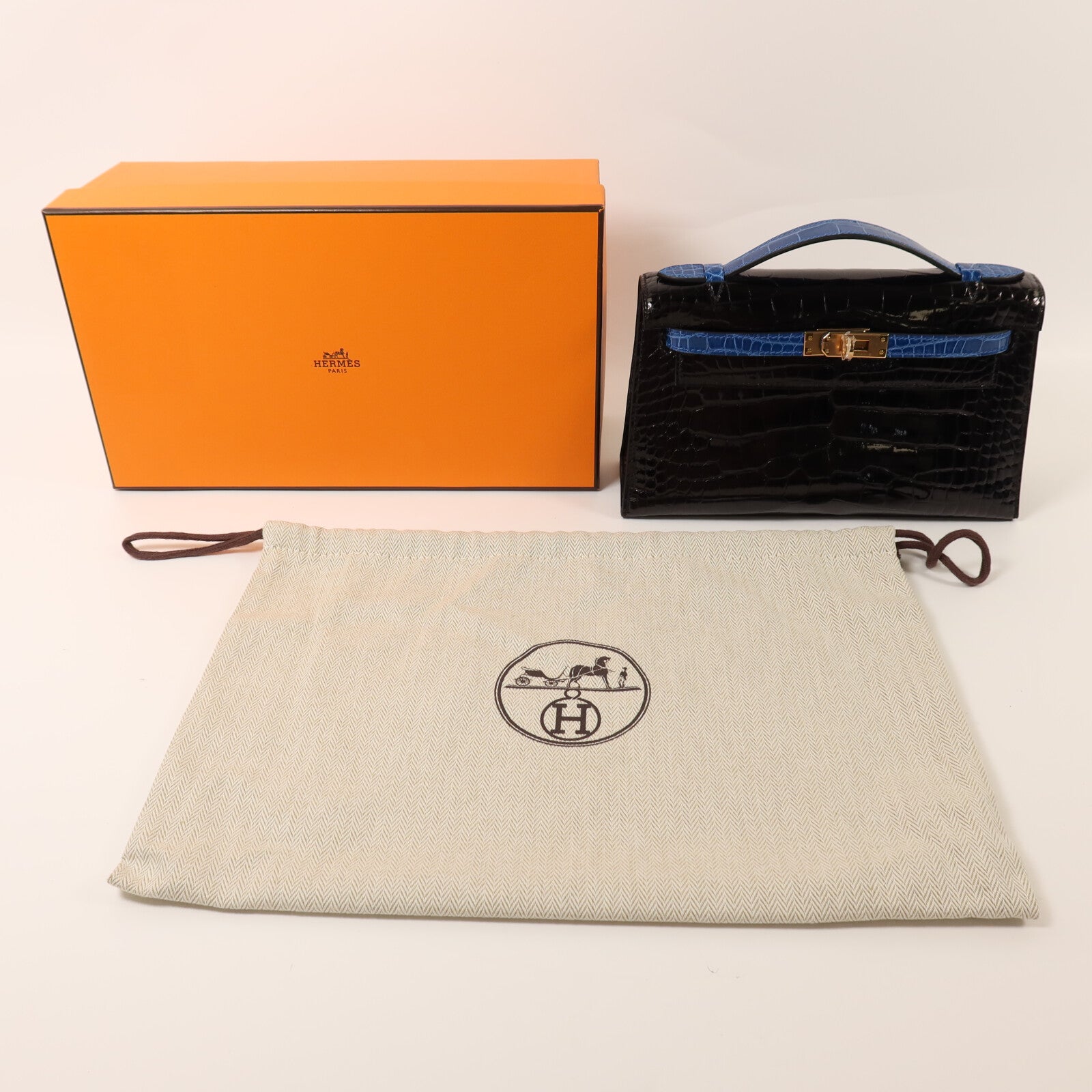 HERMES 【激減優惠】鱷魚皮革Kelly Pochette金扣手挽袋Noir/Mykonos