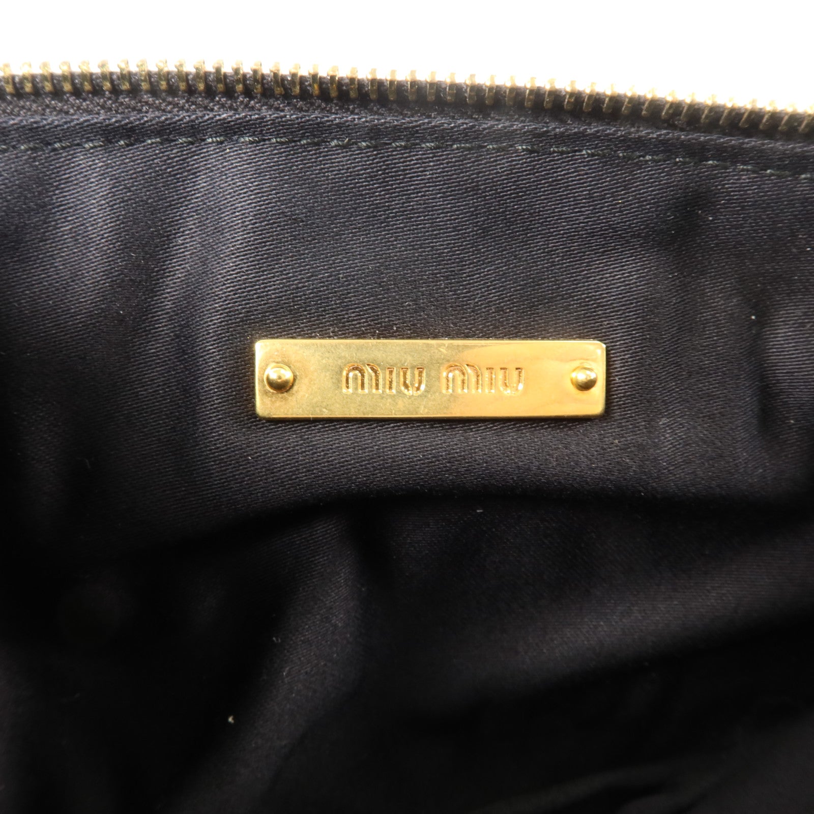 Miu Miu 羊皮皮革Clutch Bag金扣手拿包