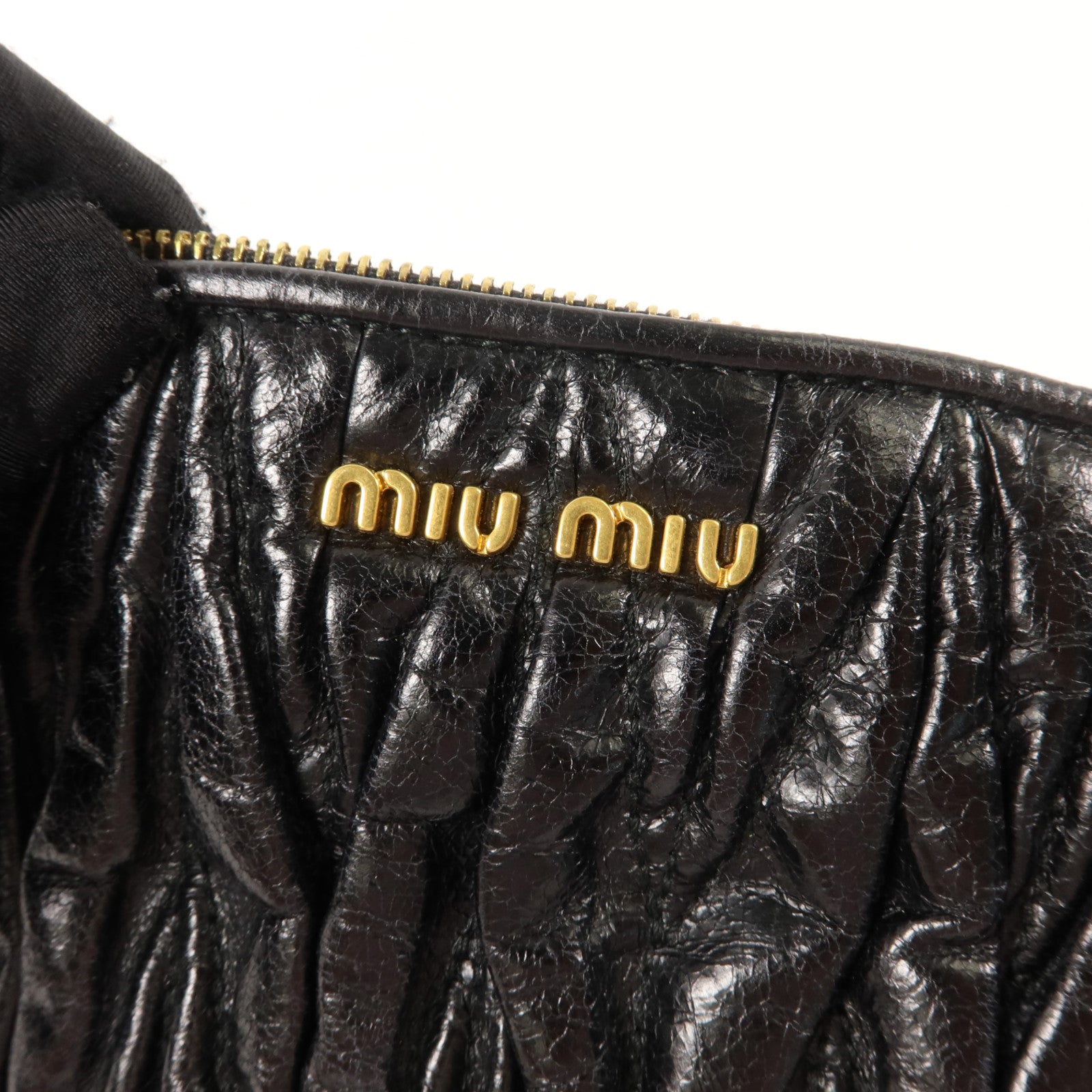 Miu Miu 羊皮皮革Clutch Bag金扣手拿包