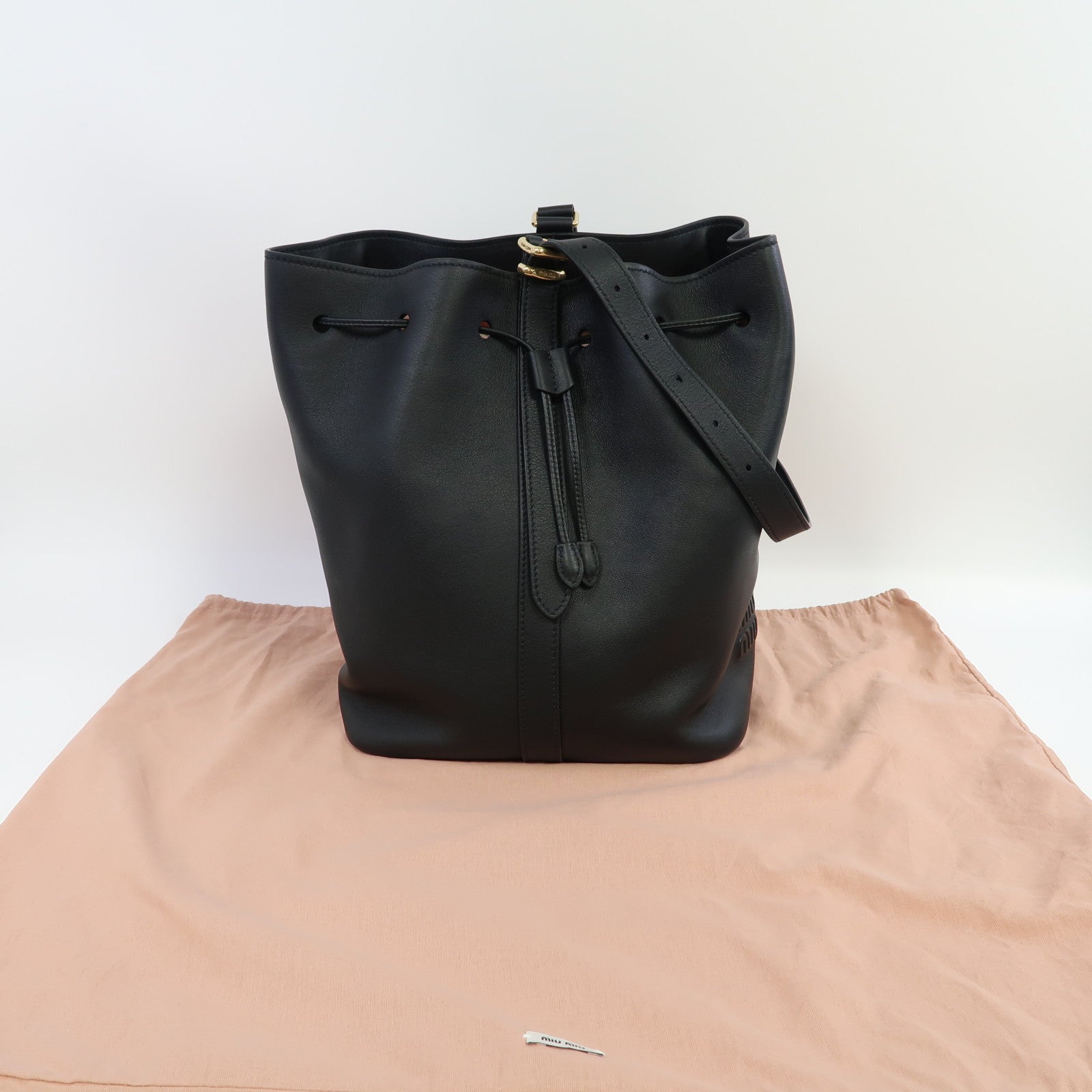 Miu Miu 牛皮皮革Bucket Bag金扣肩背袋黑色