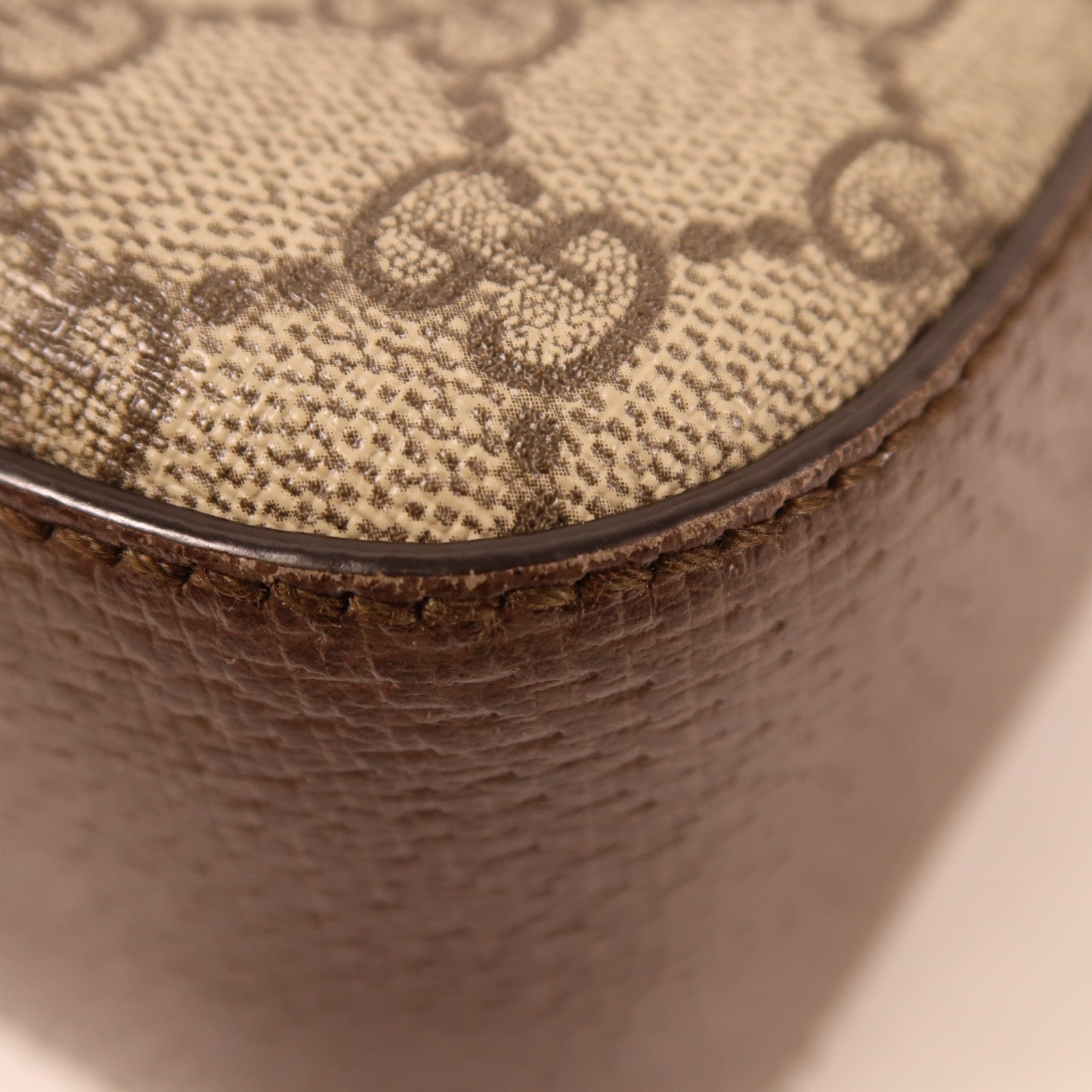 GUCCI 塗層帆布/皮革GG Supreme金扣肩背袋