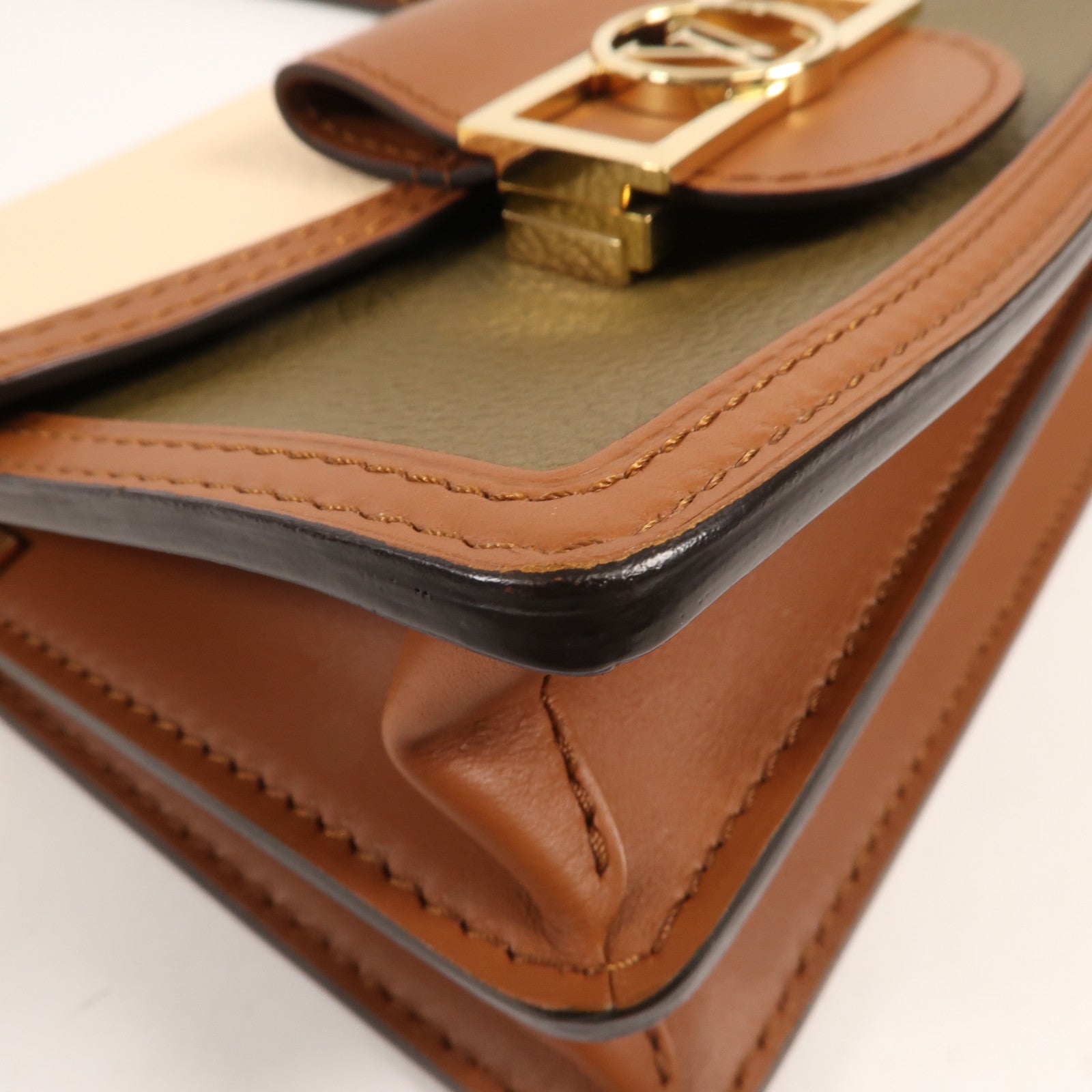 LOUIS VUITTON 牛皮皮革Douphine Mini金扣肩背袋