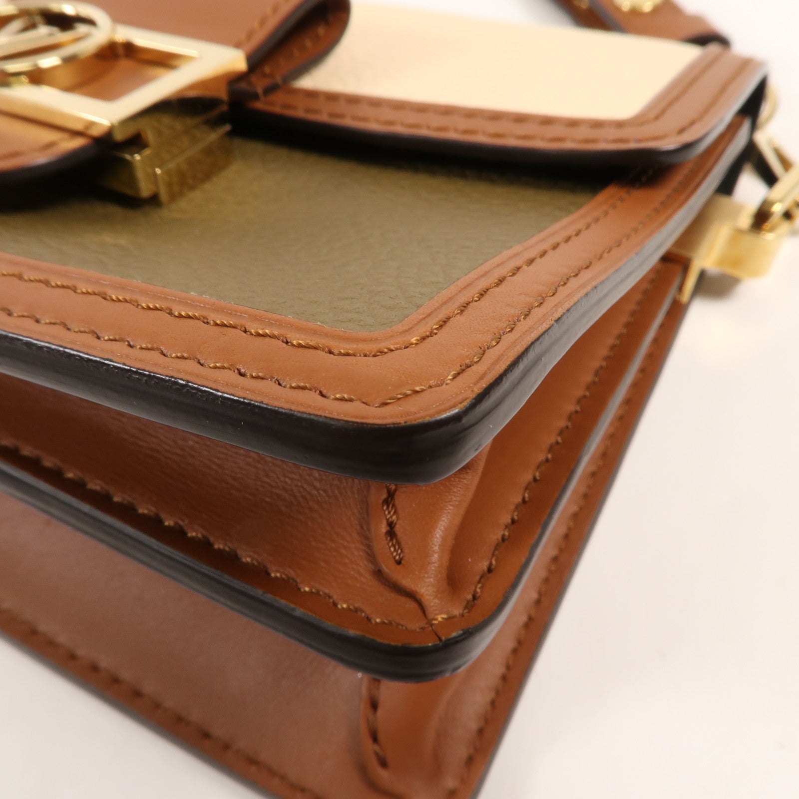 LOUIS VUITTON 牛皮皮革Douphine Mini金扣肩背袋