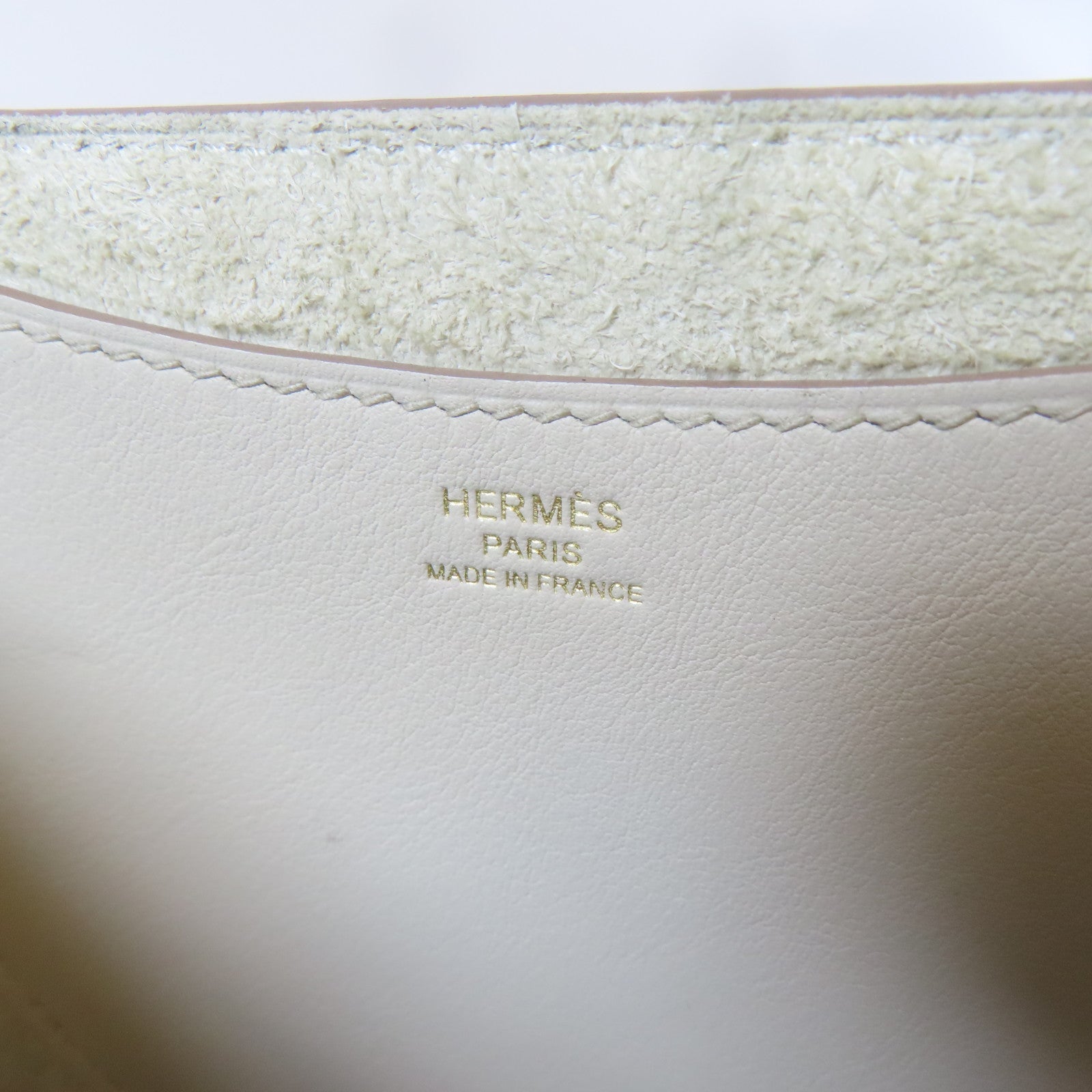 HERMES Clemence皮革In The Loop 23金扣手挽袋Beton/白色