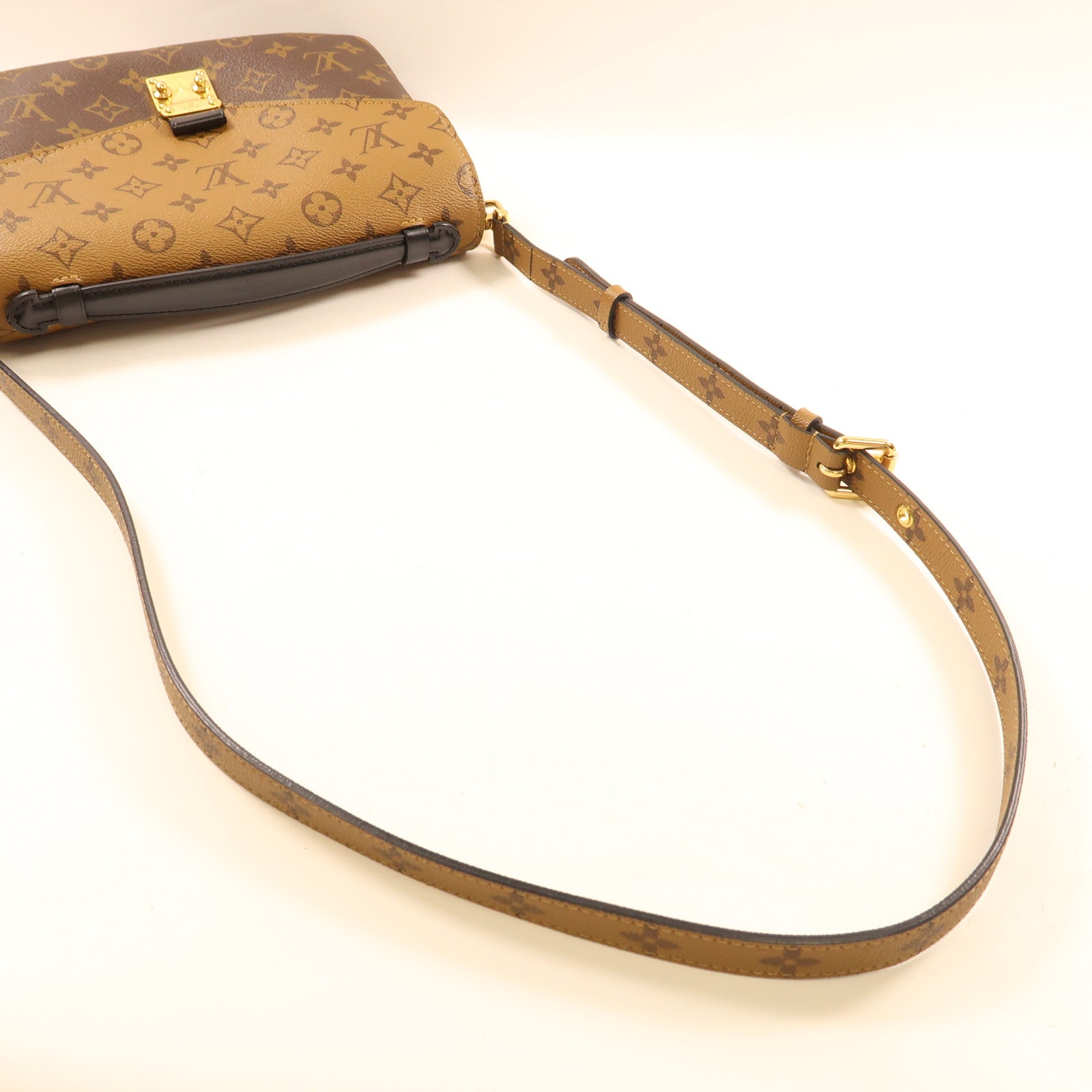 LOUIS VUITTON Monogram Reverse Pochette Metis金扣手挽肩背兩用袋棕色