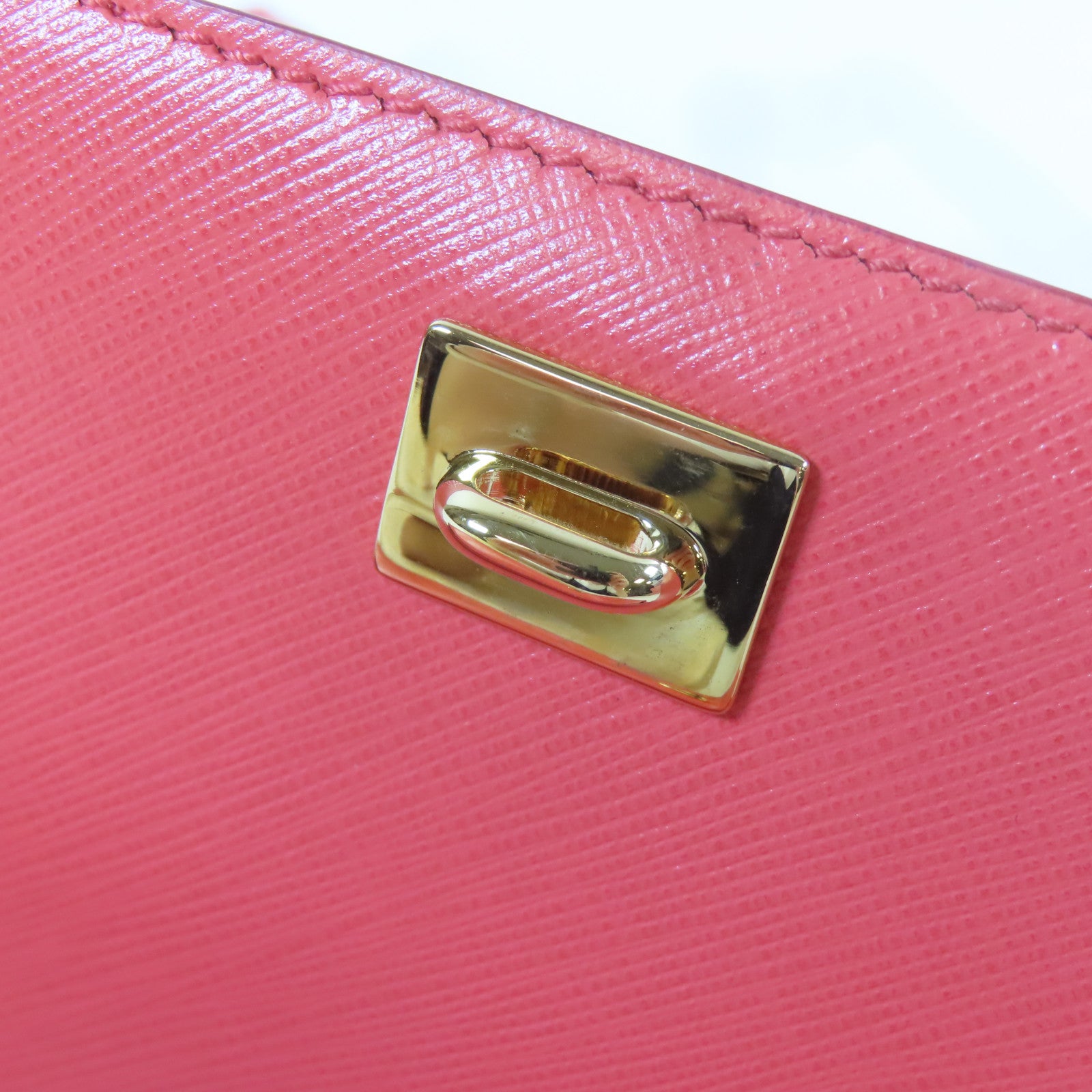 Salvatore Ferragamo 牛皮皮革Clutch Bag金扣手拿包橙色