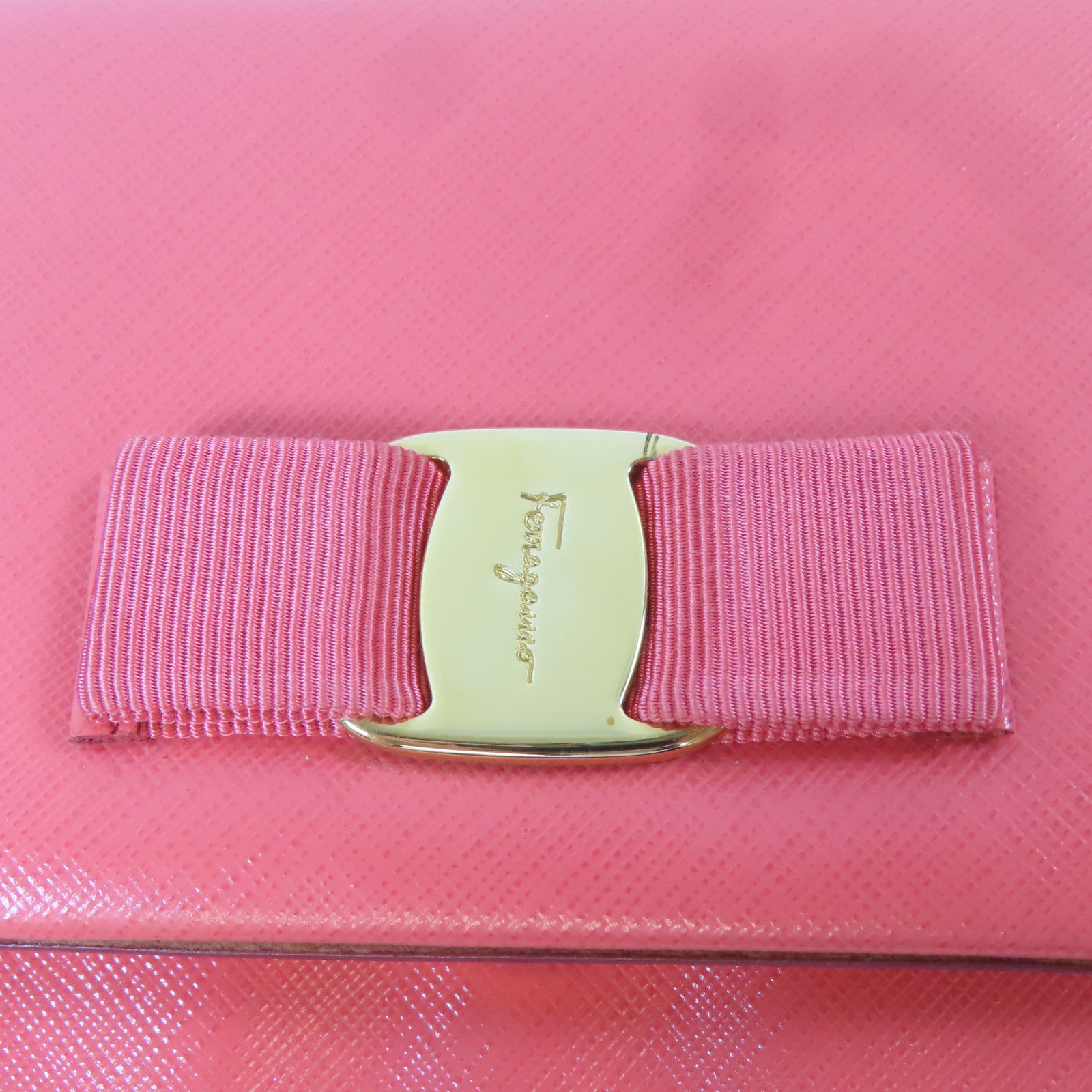 Salvatore Ferragamo 牛皮皮革Clutch Bag金扣手拿包橙色