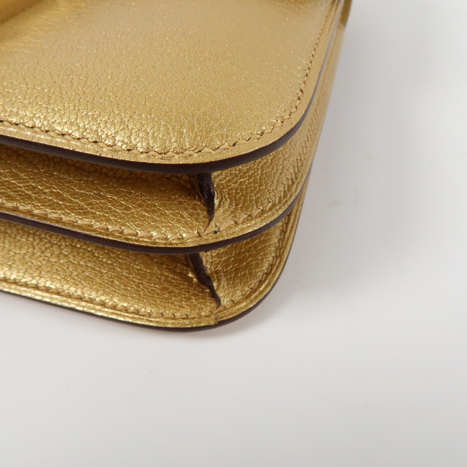 HERMES Chevre皮革Constance Mini金扣肩背袋Dore