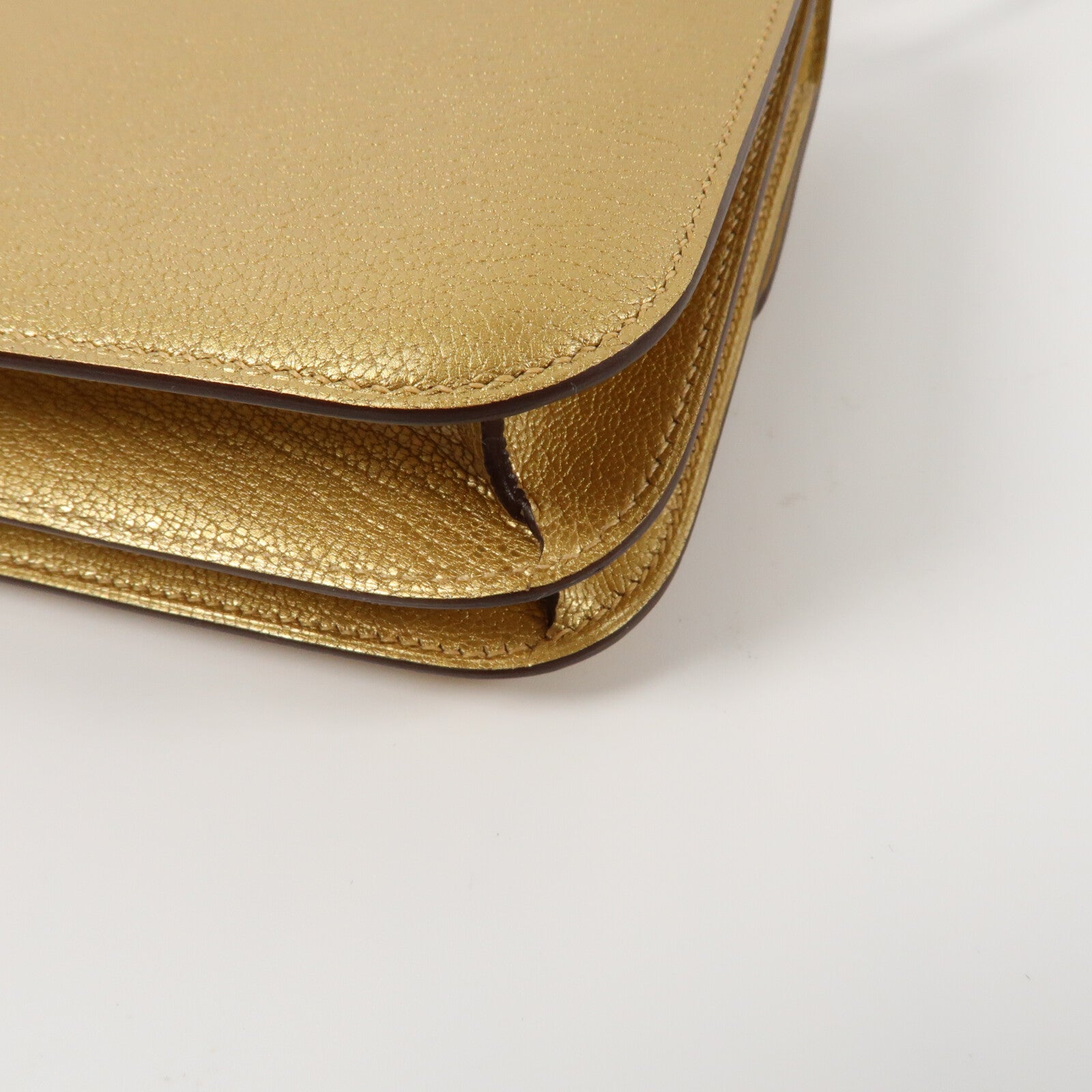 HERMES Chevre皮革Constance Mini金扣肩背袋Dore