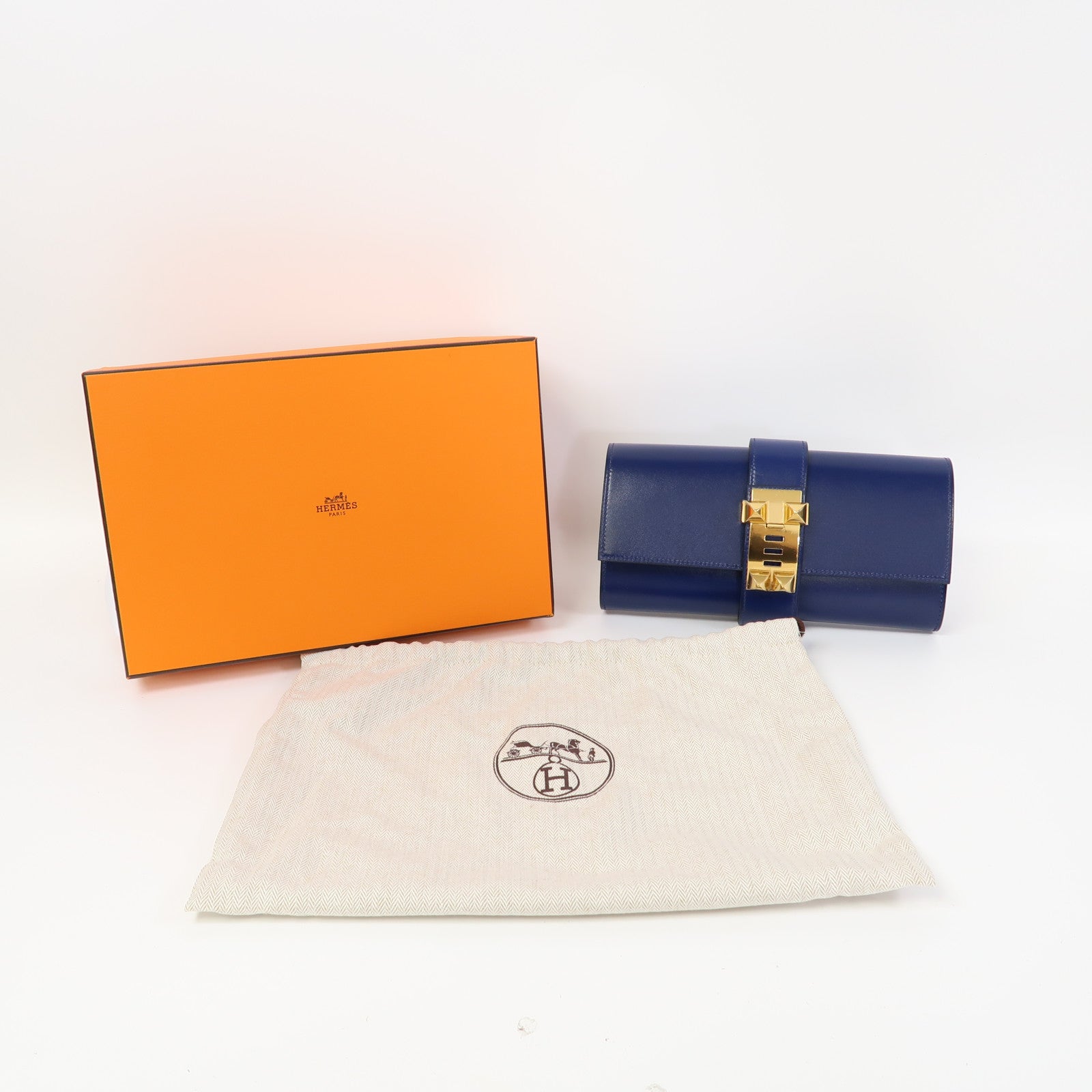 HERMES Tadelakt皮革Medor Clutch金扣手拿包寶石藍色
